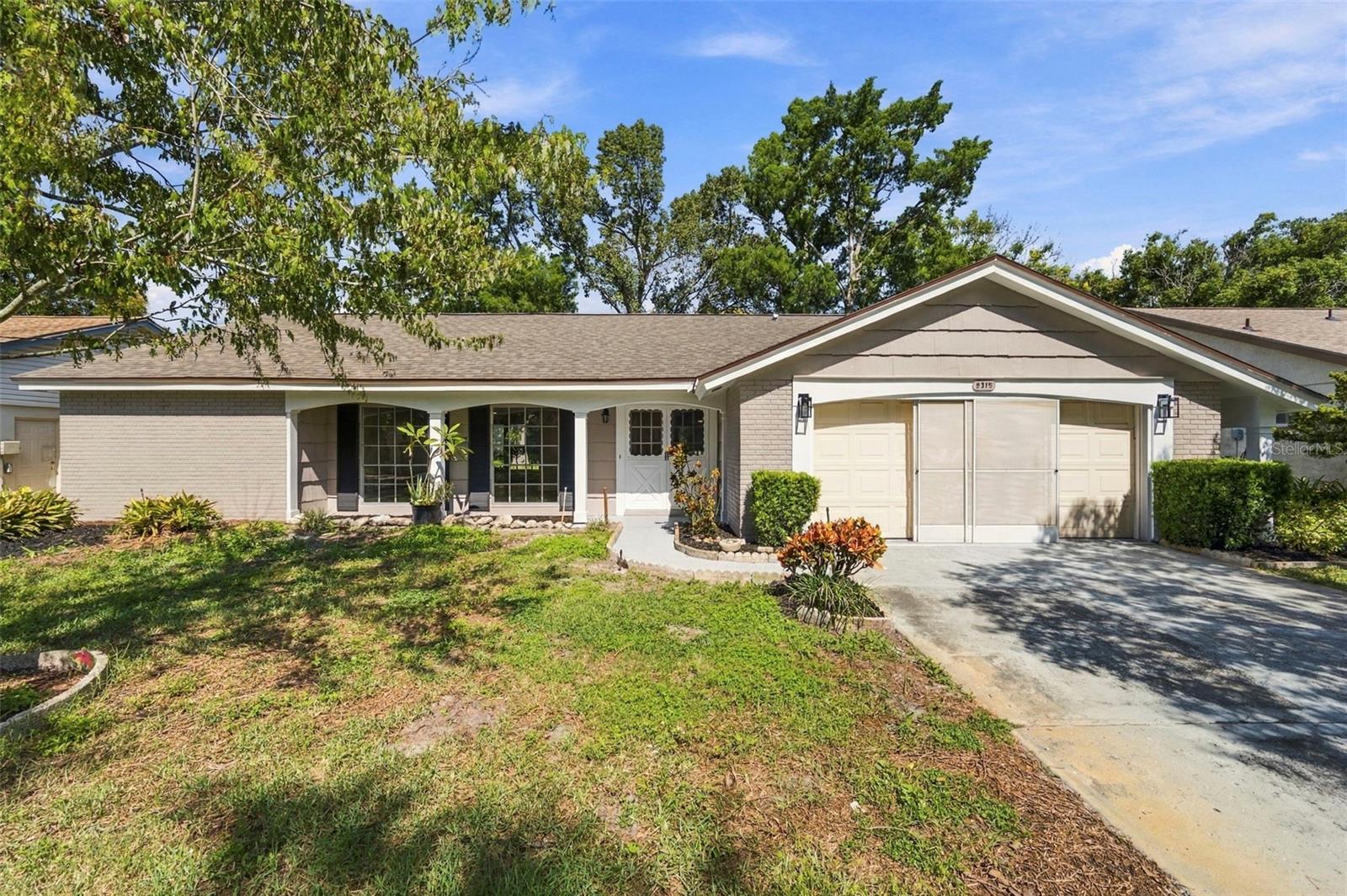 Virtually Staged. Welcome to 8315 Cavalry Drive in Hudson, FL! This beautifully renovated, move-in-ready home features a BRAND-NEW ROOF (2026), NEW HVAC (2026), fresh interior and exterior paint, and new luxury vinyl plank flooring throughout. The fully remodeled kitchen showcases brand-new cabinets, stunning quartz countertops, and a beautiful backsplash. Both bathrooms have been completely updated with new vanities and modern ceramic tile showers. Additional upgrades include new light fixtures and ceiling fans throughout. Conveniently located near shopping centers, restaurants, public beaches, major highways, and airports, this home offers the perfect combination of modern upgrades, comfort, and convenience. Schedule your private showing today!