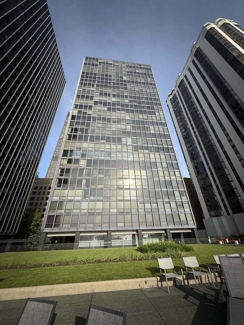 Welcome to this spectacularly renovated 3-bedroom, 2-bathroom condo at the iconic 910 N Lake Shore Drive, designed by world-renowned architect Mies van der Rohe. This mid-century modern masterpiece has been fully gutted and reimagined in 2025, offering a rare opportunity to own a completely turnkey home in one of Chicago's most architecturally significant buildings.    Step inside and be captivated by the brand-new Samsung stainless steel appliances, custom cabinetry, and elegant quartz countertops in the completely redesigned kitchen. The open layout flows seamlessly into the spacious living and dining areas, where striking wood accent panel walls add warmth and sophistication to the space. New luxury vinyl flooring runs throughout, combining durability with the look and feel of hardwood.    Both bathrooms have undergone complete renovations with contemporary vanities, designer tile work, and high-end fixtures. Every detail of this home was carefully considered, from the sleek finishes to the efficient use of space, making it a perfect blend of form and function.    The iconic 910 N Lake Shore Drive towers are celebrated examples of Mies van der Rohe's minimalist vision, featuring timeless glass-and-steel construction and clean architectural lines. Completed in 1955, the buildings were among the first high-rise residential towers in the country to utilize an exposed steel-and-glass design, paving the way for a new era of modern urban living. Today, they stand as architectural landmarks and are beloved for their elegant simplicity and enduring design.    Residents enjoy an array of amenities, including 24-hour door staff and on-site management for security and convenience, a garage rooftop sundeck with panoramic views of Lake Michigan and the city skyline, and on-site laundry facilities. Garage parking (not included) is available for lease, adding another layer of convenience to city living.    Situated in the heart of Chicago's coveted Streeterville and Gold Coast neighborhoods, this building offers unparalleled access to the city's best attractions. Step outside your door to enjoy the Lakefront Trail, Ohio Street Beach, and nearby parks. The Magnificent Mile is just a short walk away, offering world-class shopping, dining, and entertainment. Cultural destinations like the Museum of Contemporary Art, Navy Pier, and Chicago's iconic architectural landmarks are also at your fingertips.    Whether you are seeking a full-time residence or an in-town getaway, this condo offers the perfect blend of historic architecture, modern luxury, and unbeatable location. With every detail updated and upgraded, this is truly a rare offering in one of Chicago's most sought-after addresses.
