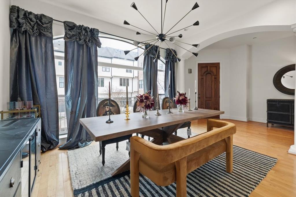 Immerse yourself in the luxury of 416 Mills Street, a 3-story haven offering a front-row seat to Downtown Fort Worth. With 2 bedrooms and 2.5 bathrooms, this 2,305 SF condo is designed for both comfort and entertainment. Hardwood floors throughout enhance the open living area, where large windows frame breathtaking views of Trinity Trails. The kitchen, complete with an island, is perfect for hosting gatherings in style. As an added delight, the master bedroom features a spiral staircase leading to a rooftop patio, providing an exclusive retreat. The spa-inspired primary bathroom is a sanctuary with dual vanities, a jetted tub, and a generously sized closet. On the first floor, a garage and an additional bedroom with an exterior gated patio await. To make this dream home yours, a $65 application fee is required for every application. Applicants should have an excellent leasing history and provide previous references. Don't miss the chance to call this rare gem your home sweet home!