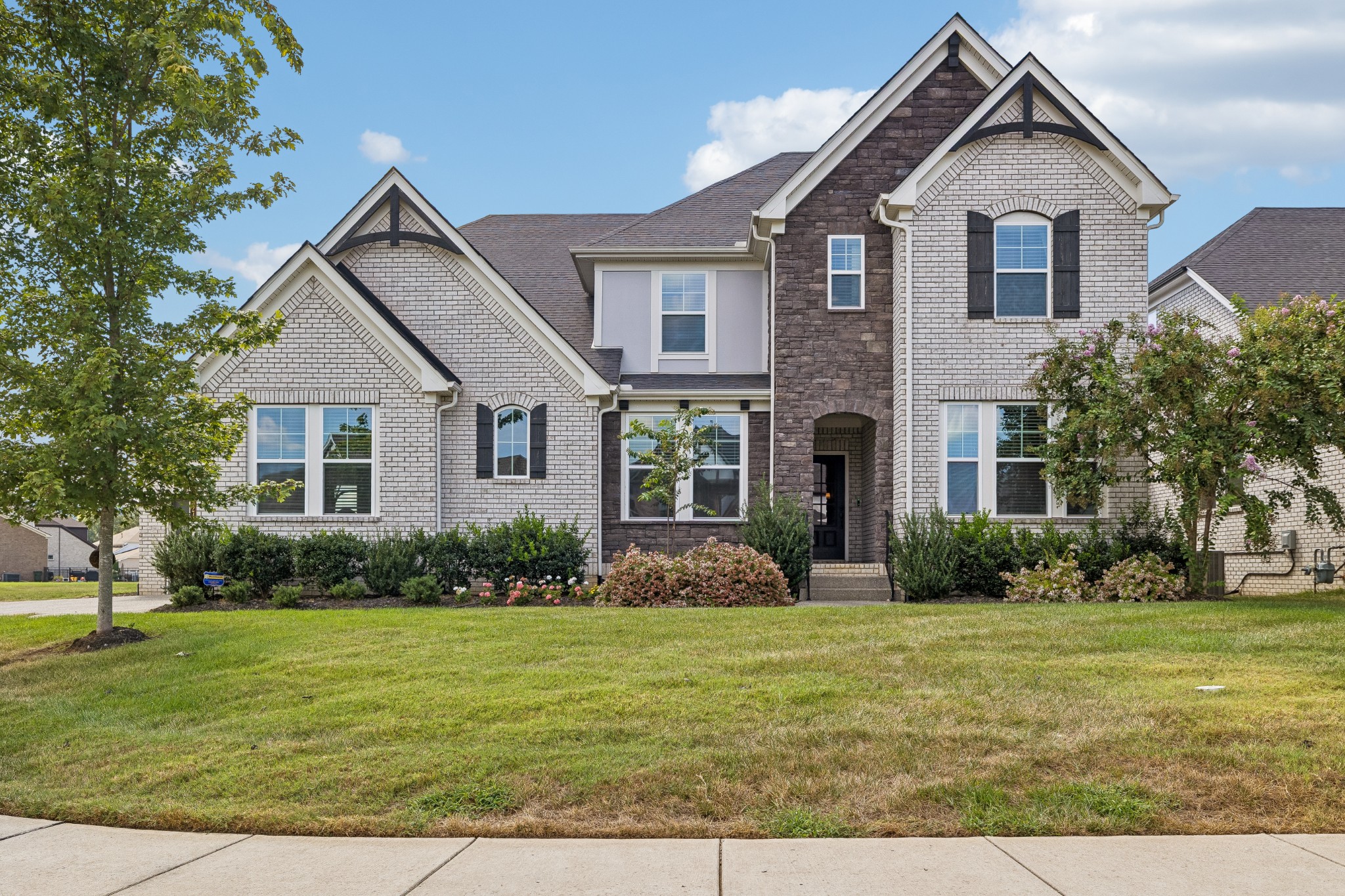 This beautifully upgraded home is a rare offering in Scales Farmstead, combining flexible living spaces, exceptional storage, and a private backyard setting in sought-after Williamson County. Zoned for highly rated Jordan Elementary, Sunset Middle, and Nolensville High School. The Drees Marshall floor plan features two bedrooms on the main level plus two additional flex spaces ideal for home offices, a study, or additional living/playroom areas downstairs. Hardwired internet data drops provide fast, reliable connectivity throughout the home—perfect for streaming and working from home. The downstairs primary suite includes a custom designed closet and frameless shower. Additional upgrades include custom built-ins in the great room, a new dishwasher and double ovens in the kitchen, an upgraded half-bath sink, and a refreshed laundry room with new flooring and wallpaper. Upstairs, you'll find two additional bedrooms with walk-in closets, a dedicated media room with custom built-ins, barn door, and a spacious bonus-room landing offering plenty of flexibility. Generous storage throughout and a three-car garage, including a carriage-style bay, provide even more functionality. The professionally landscaped, fenced in backyard backs up to HOA-maintained green space, offering added privacy and a peaceful setting. A screened-in porch with panoramic screens opens to a spacious patio and pergola, creating the perfect space for outdoor entertaining. Built in 2020, this energy-efficient home still feels fresh and new, and offers an exceptional combination of thoughtful upgrades, versatile living spaces, abundant storage, and energy-conscious design. 2524 Whitlock Trail is a private setting in one of Williamson County's desirable communities that includes a neighborhood pool, playground, walking trails and clubhouse.