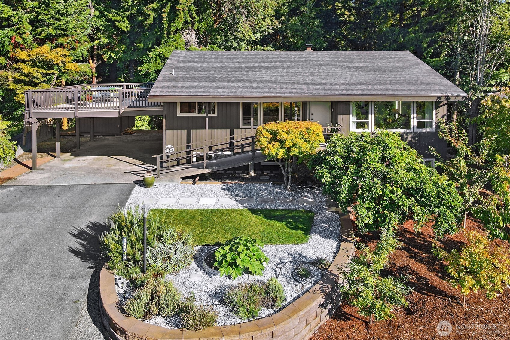 Wake up to sunrise illuminating the Olympics & unwind to sunsets over Puget Sound from your expansive deck - this Seahurst home offers a vista and lifestyle that rarely comes available. Tucked into Hurstwood, one of Burien's most tight-knit, welcoming communities, this lovely home backs to a private greenbelt near 200+ acre Seahurst Park, w/miles of wooded trails & public beach access just steps away. Inside, a true chef's kitchen has been fully remodeled w/granite island, fireclay farmhouse sink, & vented range, while guest and primary bathrooms are spa-like retreats featuring a stone soaking tub, marble flooring, & premium Hansgrohe fixtures. Downstairs, a second kitchen for effortless entertaining, & a wood stove with newly rebuilt hearth keeps the space cozy through PNW winters. The outdoor living space is your own private wellness retreat: a West Coast hot tub, 6-person Redwood Outdoors sauna w/remote & steam options, cold plunge, & outdoor shower face the private greenbelt for total seclusion. Behind the walls, this home has been meticulously updated for peace of mind: a full repipe to PEX and copper, 200-amp electrical panel w/whole-house grounding, generator transfer switch, central A/C, & dual-pane windows. A rare opportunity: mountain & sound views, walkable trails, park, and beach access - this is more than a view. It's a rhythm of life shaped by mountains, water, woods, and privacy, in a community-oriented neighborhood people never want to leave. Welcome home.