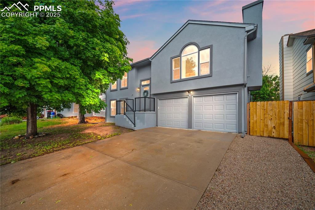 Welcome to this beautifully maintained 3-bedroom, 2-bath home nestled in the heart of highly sought-after Briargate, within the award-winning District 20 school zone. This charming home offers the perfect blend of comfort, style, and practicality — and it’s truly move-in ready! Enjoy peace of mind with a new Class IV impact-resistant roof installed in Sept 2024 — designed to withstand Colorado weather while potentially lowering your insurance premiums. The stucco exterior is not only stunning but also low maintenance for easy living. Inside, you'll find an open and inviting layout featuring no carpet throughout, central A/C, and a cozy gas fireplace perfect for chilly evenings. Take in stunning Pikes Peak views from the front windows and cook in style in the updated kitchen, complete with butcher block countertops and stainless steel appliances. The garden-level basement offers a second living space — a perfect cozy retreat — while the fully fenced backyard boasts a generous deck for entertaining, a well-maintained hot tub, and a large storage shed for all your extras. Bonuses include a two-car garage, Samsung washer & dryer, garage fridge and freezer, updated bathrooms, and a water heater replaced in 2023. Clean, updated, and ready for a new owner.  Don’t wait — schedule your showing today!