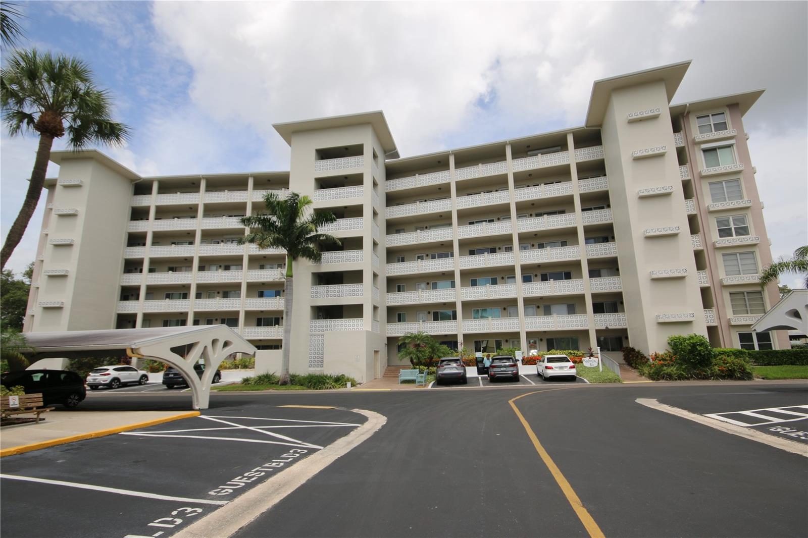 Kalmia is an Established & Well Maintained 55+ community is nestled in central Clearwater with nearby access to shopping, dining, Fine Medical Facilities and just minutes to World Famous Clearwater Beach. Park in your reserved space and take the security coded elevator to the 2nd floor.  HOA Fees include the Heated Pool (near building #5), an Active Clubhouse and recreation room with lots of activities, Billiards Room, shuffleboard, BBQ area, and Gazebo. Walking distance to Publix Shopping center - LaBelle Plaza. Perfect Snowbird Nest or Year Round Residence. This Building has a Brand New Roof.