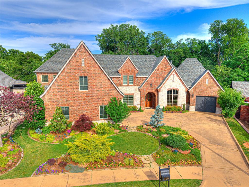 ***$100,000 instant equity! Home has just been independently appraised for $1,230,000. Seller is open to assisting Buyers with an Interest Rate Buydown or Pool Allowance** Elegant and timeless 5-bedroom, 4.5-bath home in prestigious Brookhaven on 0.72 acres! This 5,800 sq. ft property is situated on a quiet cul-de-sac in one of Norman's favorite established neighborhoods. Mature tree lined streets and pretty landscaping make living here a dream. A strong sense of community and proximity to shopping, dining, healthcare, banking etc add to the appeal. This home offers easy living with a very flexible and functional floor plan. A soaring entry greets you with views of a beautifully landscaped backyard. Working from home is a pleasure in the grand office featuring a gorgeous marble fireplace. The chef's kitchen features a 6-burner JennAir gas range, center island with prep sink, wine grotto with beverage fridge, and butler’s pantry. There are two spacious primary suites on the ground floor. Upstairs, enjoy 3 large bedrooms (every bedroom accommodates a king sized bed), a game room with custom pool table and kitchen, a theater room with wet bar and refrigerator, and bonus room for exercise or storage. Outdoors the uniqueness of this property becomes evident. Discover a fairytale wooden bridge over a serene creek bed amidst a sprawling and wooded lot, ideal for campfires and evenings under the stars and tree canopy. Suddenly you feel very far away from an in town addition! Please note, a Pool Company has been consulted, and they confirm that a pool could be accommodated on either side of the creek if desired.