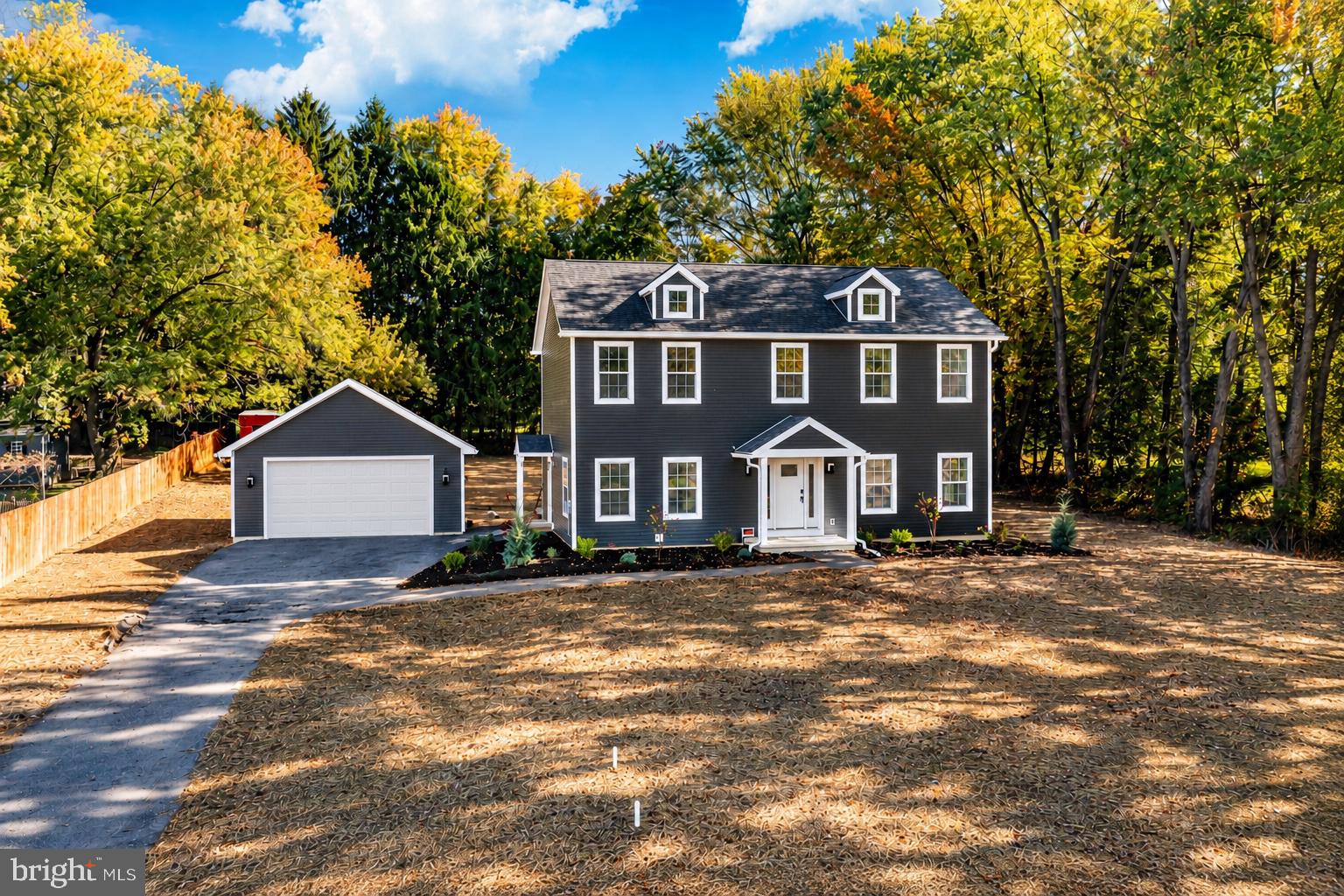 Welcome to this stunning brand-new construction Colonial, perfectly situated on a beautiful, level one-acre lot in West Caln Township, Chester County! Offering 4 generously sized bedrooms, 2.5 bathrooms, and a detached two-car garage, this thoughtfully designed home combines modern finishes, functional living spaces, and the peace of mind that comes with owning new construction.  Step inside to discover a bright and inviting open-concept main level, ideal for both everyday living and entertaining. The spacious kitchen serves as the heart of the home, featuring a large center island, ample cabinetry, and seamless flow into the adjoining living and dining areas. A dedicated first-floor office provides the perfect space for working from home or enjoying a quiet retreat. Step outside onto the rear deck overlooking the expansive, private backyard, offering endless possibilities for outdoor entertaining, recreation, and relaxation.  Upstairs, you'll find four generously sized bedrooms, including a spacious primary suite complete with a private ensuite bathroom and walk-in closet. The full unfinished basement offers tremendous potential for additional living space, a home gym, recreation room, or whatever suits your needs. Additional highlights include a detached two-car garage, on-site utilities offering the potential for reduced monthly utility expenses, and the efficiency and low-maintenance benefits of a brand-new home.  Enjoy the tranquility of a spacious one-acre property while remaining conveniently located near Hibernia Park, Chambers Lake, and Layton Park, offering abundant opportunities for outdoor recreation. Experience the perfect combination of modern comfort, privacy, and country living in this exceptional new construction home!