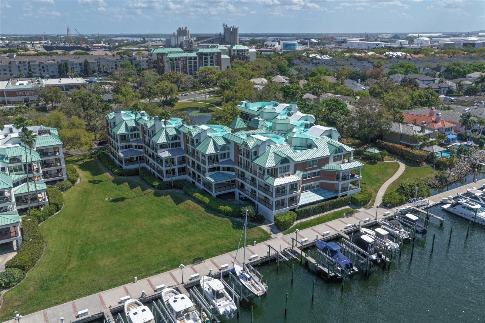 Virtually Staged. Back On The Market!!  Previous contract was terminated for reasons unrelated to the property, its condition, or the inspection.  There were no inspection issues that resulted in the termination. NEW IMPROVED PRICING presents an rare opportunity to own and customize a distinguished two-story corner penthouse in highly sought-after Seddon Cove on Harbour Island. Offering expansive natural light and beautiful water views throughout, this residence delivers an exceptional waterfront lifestyle in one of Tampa’s most desirable communities. This beautifully maintained 3-bedroom, 3-bath residence features soaring ceilings, an open floor plan, wood-burning fireplace, well-appointed kitchen with Cambria quartz countertops and newer stainless appliances with double ovens, wraparound balcony overlooking Seddon Channel, and sweeping water views from nearly every room. The flexible upper-level loft and second primary suite open to a private balcony with water and sunset views. Additional highlights include two oversized interior storage rooms, two reserved covered parking spaces, and private exterior storage. Recent improvements include roof (2026), building elevator (2025), impact windows/doors, HVAC (2015), electrical updates, fresh interior paint (2026), and more. Truly a serene oasis in the midst of city life, Seddon Cove offers 24-hour guard-gated security, resort-style pool and spa, marina access, landscaped walking paths, and walkability to Life Time Fitness just steps away, Water Street Tampa, Sparkman Wharf, Benchmark International Arena, the Tampa Riverwalk, tons of restaurants, parks, entertainment and so much more. The location is unbeatable for special events throughout the year—from fireworks for New Years and the 4th of July, to the holiday boat parades, and a local favorite, a front row view of the pirate invasion by sea to kick off Gasparilla! **Optional separate purchase: Boat slip with 30,000-lb lift available (see MLS TB8485208; buyer to verify specifications and eligibility requirements).