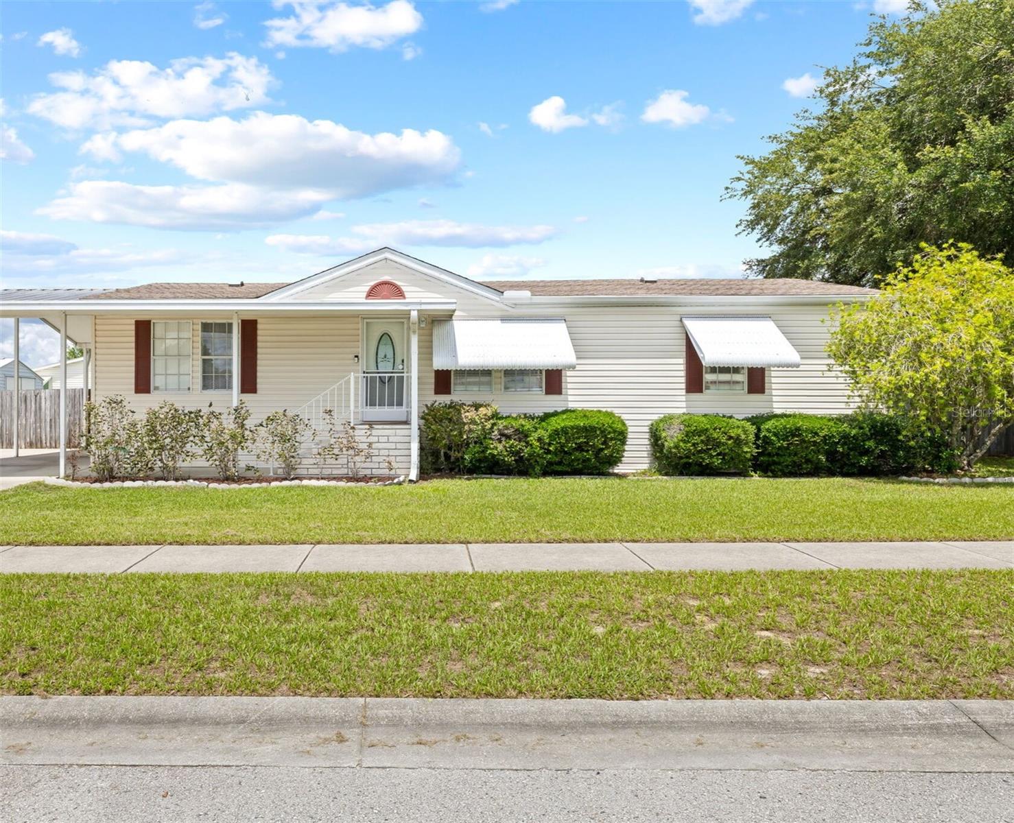 Welcome Home!
Discover this beautifully maintained 3-bedroom, 2-bath home in the Terrace Park Phase 3 community of Wesley Chapel — not a 55+ community! Built in 2000, this charming residence offers bright, open living spaces and a spacious kitchen featuring granite countertops and stainless steel appliances with plenty of room for family gatherings or entertaining. Relax in the primary suite, complete with a double vanity, walk-in shower, and luxurious soaking tub. The split floor plan ensures privacy, with the second and third bedrooms located on the opposite side of the home. Step outside to unwind on your screened-in porch or enjoy the brick paver patio, perfect for outdoor barbecue and dining.  Additional highlights include a large RV-sized carport with extra storage space and a backyard shed. The seller is even offering a credit toward a new fence.
Conveniently located 30 minutes away from Tampa, near shopping plazas, dining, medical facilities, and minutes away from the Epperson lagoon tourist attraction.  This home combines comfort, convenience, and exceptional value in one of Wesley Chapel’s most desirable locations.
Move-in ready—schedule your private tour today!