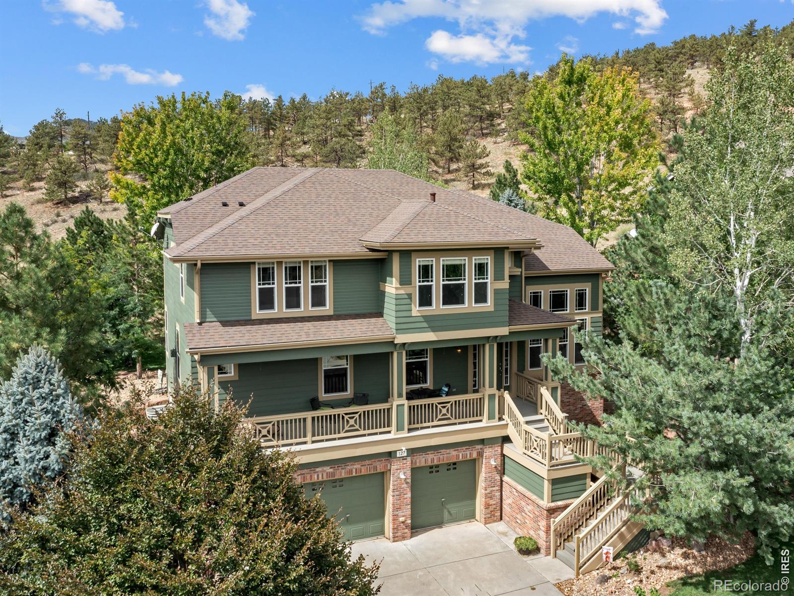 Welcome to your slice of Boulder Valley paradise. This thoughtfully designed home with a brand-new Class 4 roof and fresh exterior paint sits on a property that backs directly onto private property with tons of wildlife, privacy, and natural beauty. Walk into a generous living area with soaring ceilings. The main-level layout flows beautifully through the dining room and into an eat-in kitchen-the kind of space where people naturally gather. There's a comfortable family room for those quieter moments, a 3/4 bathroom for convenience, and a laundry room tucked away. The dedicated office space is perfect for those "work from home days". The basement where the fun lives. A workout space, a pool table area for friendly competition, a dedicated TV space, and a full bathroom. There's also a wet bar-whether you're hosting or just want your own built-in gathering spot. A guest bedroom completes the space. The primary bedroom isn't just a bedroom-it's got views of the open space behind the house. You've also got three additional bedrooms and two full bathrooms up here, so there's plenty of space. The back deck and front porch are the perfect places to relax, recharge, and appreciate the quiet location. Easy access to Boulder, Denver, and the Rocky Mountains.