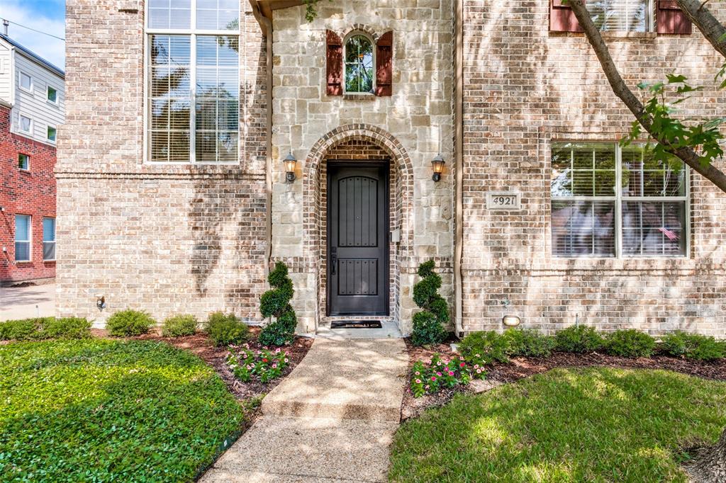 Positioned in one of Dallas’ most vibrant and walkable neighborhoods of Cochran Heights, 4921 Alcott Street is a traditional Tudor inspired residence that gives spacious and comfortable living in the heart of the city. Beautifully maintained by its one owner, this classic SFA home has an exceptional and open floor plan that includes a private, low-maintenance backyard and two-car garage. The front foyer has an arched entry that leads into the main living room with beautiful hardwood floors, crown molding, high ceilings and a cozy fireplace with gas logs. The stunning formal dining room is separate but open to living area, allowing for proper yet casual entertaining of family and friends. The bright and open kitchen has many windows and natural light, stainless steel appliances including a JennAire gas range, granite countertops and plenty of counter and cabinet space. Kitchen also includes a center island, counter bar seating, a walk-in pantry and a separate breakfast nook space. The guest bedroom downstairs has an attached full bath and walk-in closet, making for convenient hosting of guests or as an easily accessible in-laws suite. Upstairs is an open office, game room or flex space and two additional bedrooms. The oversized primary suite has vaulted ceilings and space for a seating area. The large ensuite bathroom has double sinks and vanities with tons of counter space, separate shower and jetted tub, plus a HUGE walk-in closet! This type of quality and space is hard to find in the city, especially in Dallas' new hottest area - Knox District! No HOA! New roof installed May 2026, New water heater July 2026. Appliances and furniture are also negotiable!