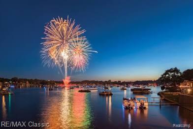 Deeded boat dock on All sports Lake Ponemah new construction basement is in still time to pick out some of your finishes. Model is available to see and we have started another custom lake view home now. Build now and be on the lake for Summer 2026. Cottage Cove subdivision has deeded boat docking and you get access to all 3 lakes -Ponemah, Tupper, and Squaw with great fishing, swimming, skiing, floating, kayaking, ice skating & snowmobiling for year round fun.  Digging basement now. Model next door available to walk through but is sold.This 2100 sq ft built craftsman style cottage home offers luxury and charm, perfectly situated in a quiet and friendly community, You can enjoy the breathtaking views of Ponemah or hop in the boat to explore all that the chain of lakes has to offer. This stunning home features an open floor plan Great room Kitchen & dining all have a view to the water with a door wall to your covered balcony deck as well. Kitchen features walk in pantry & all granite with island bar.The large master suite with full ceramic bathroom. 2 other generously sized bedrooms and a laundry room upstairs are sure to please. Full basement is perfect for finishing or storage of your lake toys. Whether your boating, swimming, or entertaining on the deck overlooking the water, this home offers a lakeside lifestyle close to restaurants, bars, shopping and freeways! Other lots available here and in the surrounding area's Model ready to view in Liberty Shores across from lake Ponemah