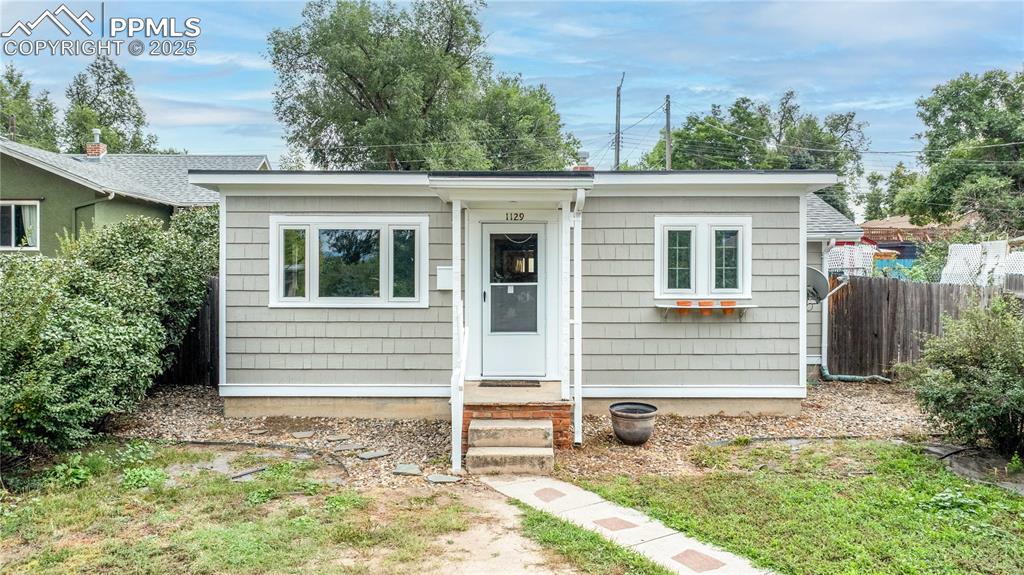 Charming 1926 home full of character and potential! This property showcases beautiful woodwork, built-in cabinets and shelving, hardwood and parquet floors, plus tongue-and-groove and beamed ceilings. Multiple upgrades have been made throughout, including new exterior and interior paint. Enjoy a finished bonus room in the basement, and fenced front and back yards with paved alley access to the garage and backyard. Sitting on an oversized 6,895 square foot lot zoned R1-6, this property offers flexibility for future expansion. Ideally located close to downtown, parks, schools, recreation, and shopping!  Come take a look for yourself and schedule your showing today!