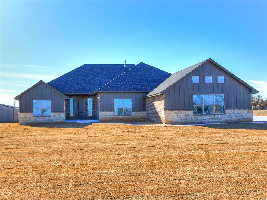 *****BUILDER INCENTIVE: $10,000 AVAILABLE TO USE TOWARD CLOSING COSTS, UPGRADES, OR A RATE BUY-DOWN! LENDER INCENTIVE: Participating lender offering a 1% bonus toward closing costs or interest rate buy-down!*****For added peace of mind, this home includes the standard builder’s warranty plus an additional 10-year Limited Structural third party Warranty through RWC, offering long-term confidence in your investment!Welcome to this exceptional new construction home by an award-winning metro builder—where thoughtful design meets impressive space. Currently under construction, this 4-bedroom, 3-bath beauty also features a versatile flex room perfect for a home office, gym, or playroom, plus an oversized 4-car garage with room to spare.The open living area is highlighted by a premium fireplace, creating a warm and inviting atmosphere. The kitchen shines with granite countertops and stainless steel appliances, ideal for both everyday living and entertaining. The primary suite offers a peaceful retreat with a stunning bay window and a spa-inspired bath. One secondary bedroom includes its own private bathroom—perfect for guests or multigenerational living. An oversized utility room provides extra storage and functionality.Situated on nearly an acre (.87), the property also includes a 30x40 shop with a concrete pad, overhead door, walk-through door, and moisture barrier insulation—perfect for hobbies, storage, or all your toys. This is your opportunity to grab up this stunning new home with space, style, and unbeatable incentives—don’t miss it!For informational purposes: HOA dues are $400 per year. This amount is sometimes posted as monthly on real estate websites.