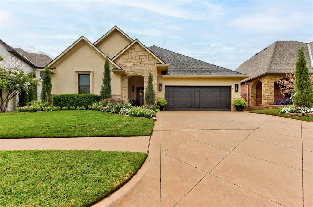 Tucked inside the gated golf course community of Rose Creek, this one level floor plan welcomes you with an open concept layout featuring three spacious bedrooms and two bathrooms. The kitchen features two pantries, double ovens, gas stovetop, a large island and bar area.  All bedrooms have vaulted ceilings and spacious closets. Front secondary bedroom has a built-in Murphy bed. New roof and interior paint in 2020. Recent updates include new stove, sink, fan, light fixtures, fence, sod, French drains, landscaping, and HVAC. Don't miss the amazing retractable roof in the backyard!   Rose Creek is a perfectly located Edmond community that includes 24/7 security as well as a one-of-kind pool, park, and fitness center.