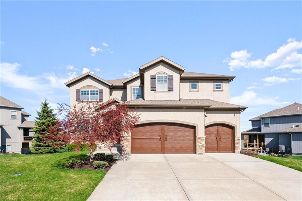 You do not want to miss this gorgeous one owner 2-story plan in the Crossings neighborhood of Cedar Creek. Skip the carpool line and walk to Cedar Creek Elementary.  This five bedroom, five bathroom home with a bedroom and full bath on main level also features a loft and fully finished walk out basement. Enjoy an evening by the fire from one of two stacked stone fireplaces or catch the latest release on the projector screen that stays with the property.  Both kitchens boast stainless steel appliances and quality materials throughout including granite countertops,  beautiful alder cabinetry and travertine backsplash.  Designated dining space with gorgeous moldings for those that hosts holidays or more formal dining events or turn it in a play space.  It's move in ready with fresh paint inside and out as well as a new ac installed last year. 
Cedar Creek offers an array of recreational activities with resort style pools, lake, pickleball/tennis courts to walking trails and more..it's one of a kind in KC.
