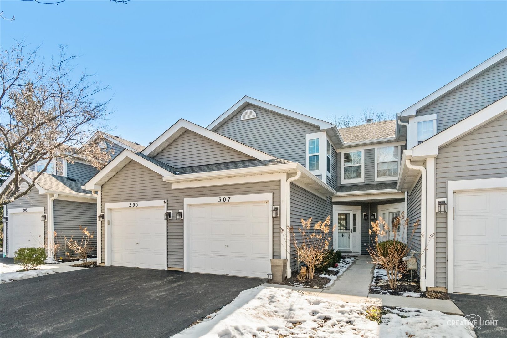 Are you dreaming of living in an updated home with a relaxing pond view? If so, your dream could soon become a reality. This beautifully updated residence was thoughtfully redesigned by architect Steve Vasilion, blending style and comfort throughout. The kitchen features rich cherry cabinets, stainless steel appliances, and even a built-in wine fridge-perfect for entertaining or enjoying a quiet evening at home. The inviting family room centers around a stunning Cosentino fireplace, complemented by custom built-in cabinetry that adds both charm and functionality. Upstairs, you'll find two spacious bedrooms, including a serene primary suite with a vaulted ceiling, decorative ledge, ceiling fan with light, and a private full en suite bath. An additional full bath and a convenient second-floor laundry room complete the upper level. Step outside to your own private patio where you can unwind and take in the peaceful pond views. All of this is set in a fantastic location close to the shopping, dining, and conveniences along Randall Road. This is a home that truly offers comfort, style, and a setting you'll love coming home to.