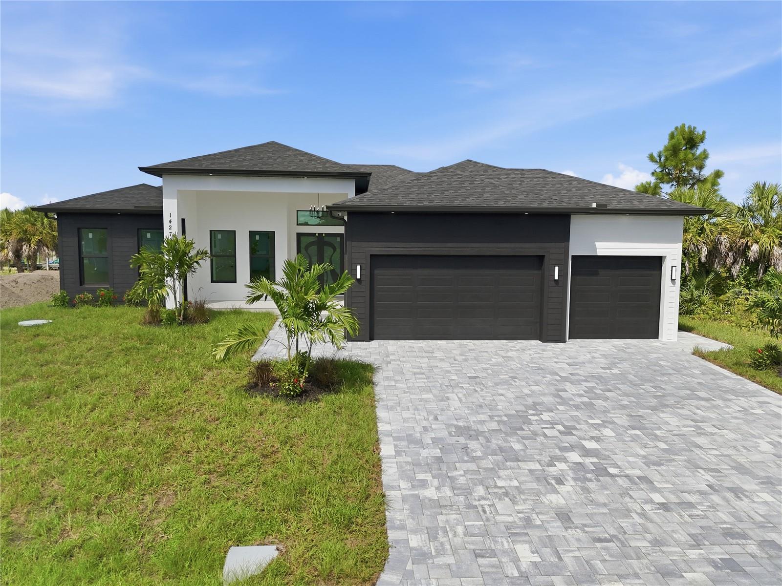 Beautiful new construction Pool Home this prime, canal-front homesite located in the popular waterfront community of South Gulf Cove! Boasting 80 feet of brackish water canal frontage, this east-facing 0.23-acre interior lot offers the ideal setting for this new construction, 4 Bed 3 and a half baths Home  with a private pool and spa , Impact windows and doors  tile floors ,Quartz Countertops, 3 car garage and backyard boat dock.  Experience the ultimate Southwest Florida boating and outdoor lifestyle with quick access to area waterways, world-class fishing, and just a short drive to the pristine Gulf beaches of Gasparilla Island and Boca Grande. Conveniently situated near local shopping, dining, and golf courses, this community features public water and sewer availability along with an optional, low-cost voluntary association ($120/year). Bring your own builder and start living the sunshine state dream!
