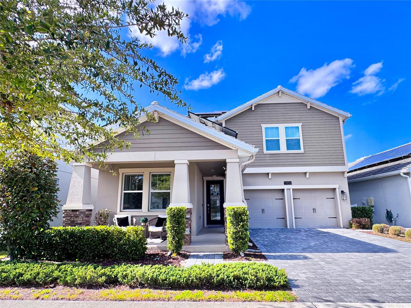 Under contract-accepting backup offers. STUNNING WATER VIEW!!! Welcome to this spacious and luxury designed residence offering 3,359 square feet of living space. This home perfectly blends comfort, functionality, and scenic views. Featuring 5 bedrooms, including a private primary suite on the second floor, and a convenient guest bedroom on the first level, this layout is ideal for both family living and hosting visitors. The home includes 3 full bathrooms, thoughtfully designed for convenience and style. On the main floor, you’ll find a versatile formal dining area that can easily be converted into a lounge, as well as a dedicated home office, perfect for remote work or study. The space also features a spacious living room, modern kitchen, and cozy breakfast nook, creating an ideal flow for everyday living and entertaining.The second level offers a well-designed and comfortable layout, featuring a cozy family loft area, perfect for relaxing or additional living space. All four upstairs bedrooms include walk-in closets, while the primary suite boasts two separate walk-in closets—his and hers—providing ample storage and privacy. A conveniently located laundry room on the second floor, complete with a washer and dryer, adds everyday ease and functionality. Step outside to enjoy a covered terrace and backyard with breathtaking lake views, perfect for relaxing or entertaining.Additional highlights include a 3-car garage and a prime location near top-rated schools, with direct access to major highways 528 and 417, and just 15 minutes from Orlando International Airport.This home offers the perfect combination of space, location, and lifestyle.