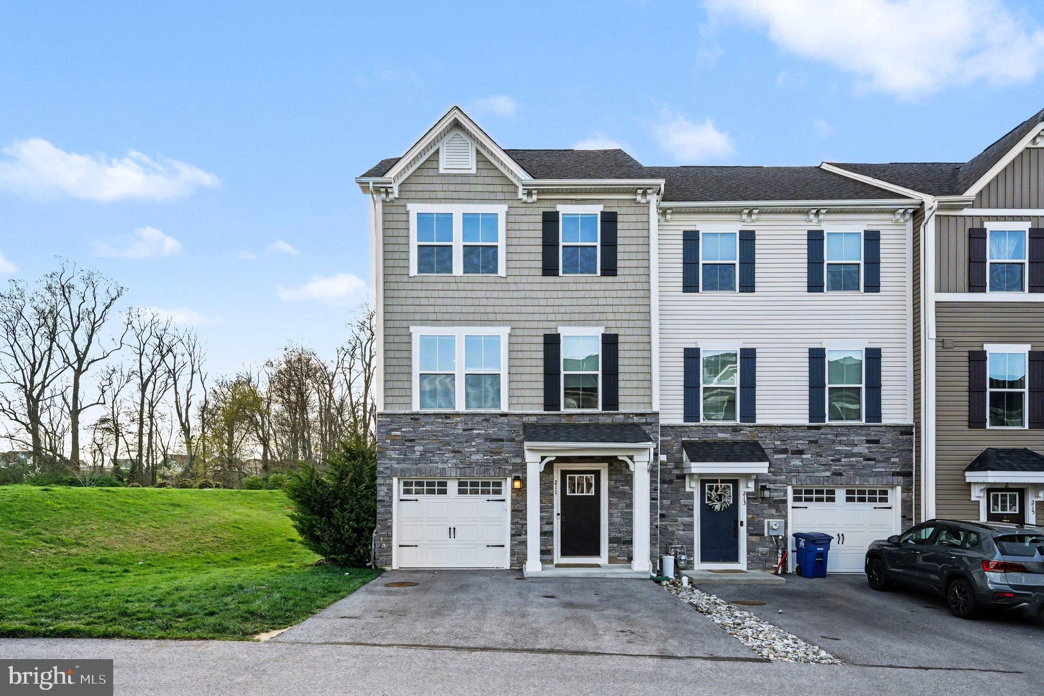 This beautifully maintained end-unit townhome, only five years old, is truly move-in ready. The entry level offers a versatile open living space with direct access to the backyard—perfect for a home office, gym, or additional lounge area.  A convenient half bath completes this level.Upstairs, the main living level features a stunning gourmet kitchen complete with a large granite island, dedicated coffee bar, and ample space for both a casual café table and a formal dining area. The layout flows seamlessly into the bright and spacious living room, which opens to a large Trex deck—ideal for entertaining or relaxing outdoors.The upper floor hosts a luxurious primary suite with tray ceilings, a spacious walk-in closet, and an upgraded en-suite bath featuring a double vanity, glass-enclosed shower, and a separate soaking tub. Two additional bedrooms with generous closet space and a full hall bath provide comfort and flexibility.Situated in the highly sought-after Mapleview community within the top-rated Downingtown Area School District, this home is just minutes from shopping, parks, and major commuter routes—offering both convenience and lifestyle.