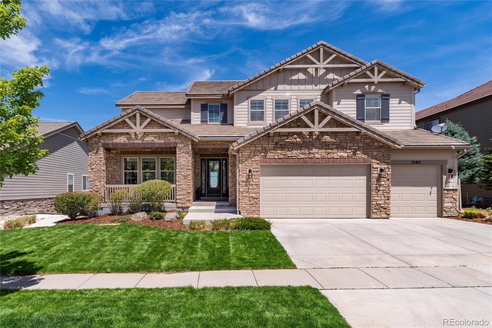 Welcome to this exceptional former model home in the highly sought-after Anthem Highlands community, offering 6 BDRMS, 6 BATHS, breathtaking mountain views, and designer finishes throughout. From the moment you enter, you'll appreciate the custom woodwork, elegant custom paint, and thoughtfully designed floor plan. The main level features formal dining, a spacious great room filled with natural light, a gourmet kitchen with an adjoining dining area, a reverse osmosis water filtration system, and a private guest suite with an en-suite bath—perfect for visitors or multigenerational living. Upstairs, the luxurious primary retreat offers a private sitting room, spa-inspired bath, and stunning mountain views. Three additional bedrooms, including a secondary en-suite, a versatile loft, convenient upstairs laundry, and additional full and three-quarter baths provide plenty of space for family and guests. Built-in shelving and custom closet systems add both style and functionality throughout the home. The finished basement is designed for entertaining and everyday enjoyment, featuring a large recreation room, custom bar, additional bedroom and full bath, plus a flexible bonus room ideal for a playroom, home gym, or hobby space. Recent updates include new interior paint and new carpet, making this home truly move-in ready. Step outside to enjoy Colorado living at its finest with panoramic mountain views from every floor. The upper deck features a built-in BBQ, while the walkout basement opens to a covered patio and beautifully landscaped backyard with a fire pit, creating the perfect setting for entertaining and relaxing year-round. Combining luxury, functionality, and an unbeatable Anthem Highlands location with access to parks, trails, community amenities, and top-rated schools, this is a rare opportunity to own one of the community's most impressive homes.
