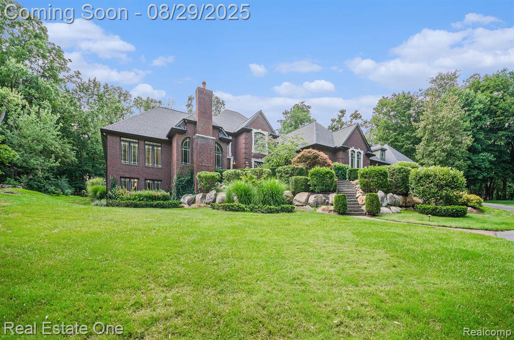 Experience the perfect blend of country tranquility and luxury living just 10 minutes from downtown Rochester. Nestled on over 5 acres of beautifully landscaped grounds, this custom-built estate offers unmatched privacy, space, and functionality—an ideal retreat for discerning buyers. Car enthusiasts will appreciate the ability to house up to eight vehicles, with expansive garage space, multiple driveways, and abundant storage.
Inside, you’ll find 4,000+ sq. ft. of thoughtfully designed living space filled with natural light from oversized windows and soaring ceilings. Formal living and dining areas showcase elegant finishes, while the expansive family room provides a warm, inviting atmosphere for everyday living or entertaining. The flexible layout easily adapts to your needs, whether you envision a media room, home office, gym, or playroom.
The gourmet kitchen is a culinary masterpiece featuring high-end appliances, granite countertops, custom cabinetry, and a large center island. Enjoy morning coffee in the bright breakfast nook overlooking your serene backyard. The primary suite is a luxurious retreat with a spa-inspired bath, dual vanities, a walk-in shower, and a spacious walk-in closet. Additional bedrooms offer comfort and privacy for family or guests.
Outdoors, the 5+ acre setting is perfect for relaxation or recreation—add a pool, sports court, or gardens, or simply savor the open space surrounded by mature trees and manicured lawns. Located near parks, trails, top-rated schools, shopping, and dining, this home combines the peace of country living with the convenience of city access.
Move-in ready with 30-day possession, this exceptional property delivers elegance, space, and functionality in one rare offering. Don’t miss the opportunity to own one of the area’s finest homes.