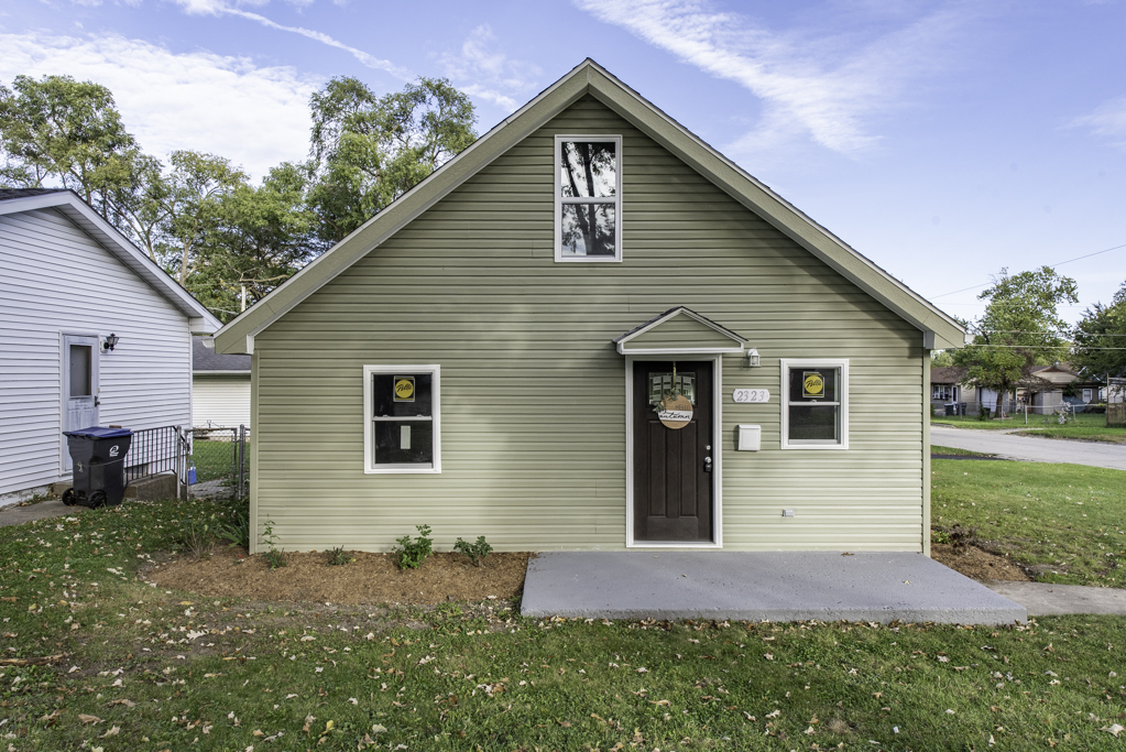 Beautifully remodeled and ready for its new owners! This spacious 5-bedroom, 2-bath home in Zion has been updated from top to bottom! Featuring a brand-new roof, siding, windows. updated electrical, HVAC flooring, fresh paint, modern lighting throughout and updated electrical and plumbing You'll love the bright, open feel connecting the living room, dining room, and updated kitchen with white cabinetry and stainless steel appliances.    All five bedrooms offer plenty of flexibility, plus there's a bonus room with sliding patio doors leading to a concrete patio, perfect for your morning coffee or additional sitting space. Both bathrooms have been completely remodeled! Major updates also include electrical, plumbing, a new high-efficiency furnace, and water heater.    Need parking? You'll appreciate the TWO driveways and oversized 2-car detached garage! The unfinished basement offers additional storage space.    So many big-ticket updates already taken care of!