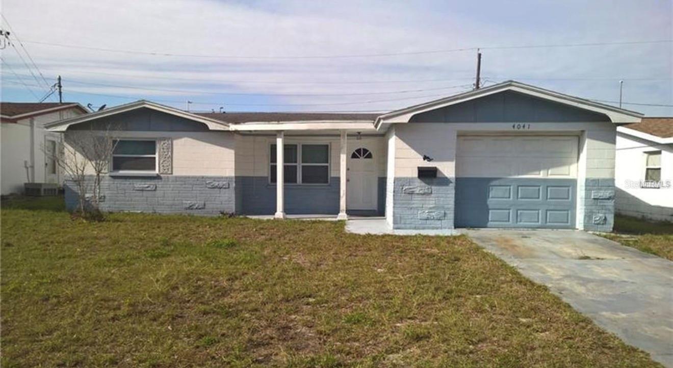 Welcome home to this charming 2 bedroom, 1 bath home with a 1-car garage offering just under 1,000 square feet of comfortable living space. Conveniently located just east of the US-19 and State Road 54 intersection, this home is in a desirable location where NO flood insurance is required. Major updates include newer windows, roof, AC, and water heater, giving you added peace of mind. All kitchen appliances, as well as the washer and dryer, are included, making this home truly move-in ready. Step outside to a spacious, fully fenced backyard with endless possibilities, perfect for entertaining, gardening, pets, or simply relaxing in your own private outdoor retreat. Situated on a quiet dead-end street with minimal traffic, you'll enjoy both privacy and convenience. Shopping, restaurants and everyday amenities are just minutes away. Whether you're a first time homebuyer, looking to downsize, or searching for a fantastic investment property, this wonderful home offers exceptional value. Don't miss your opportunity, this home won't last long! Home is being Sold As Is.