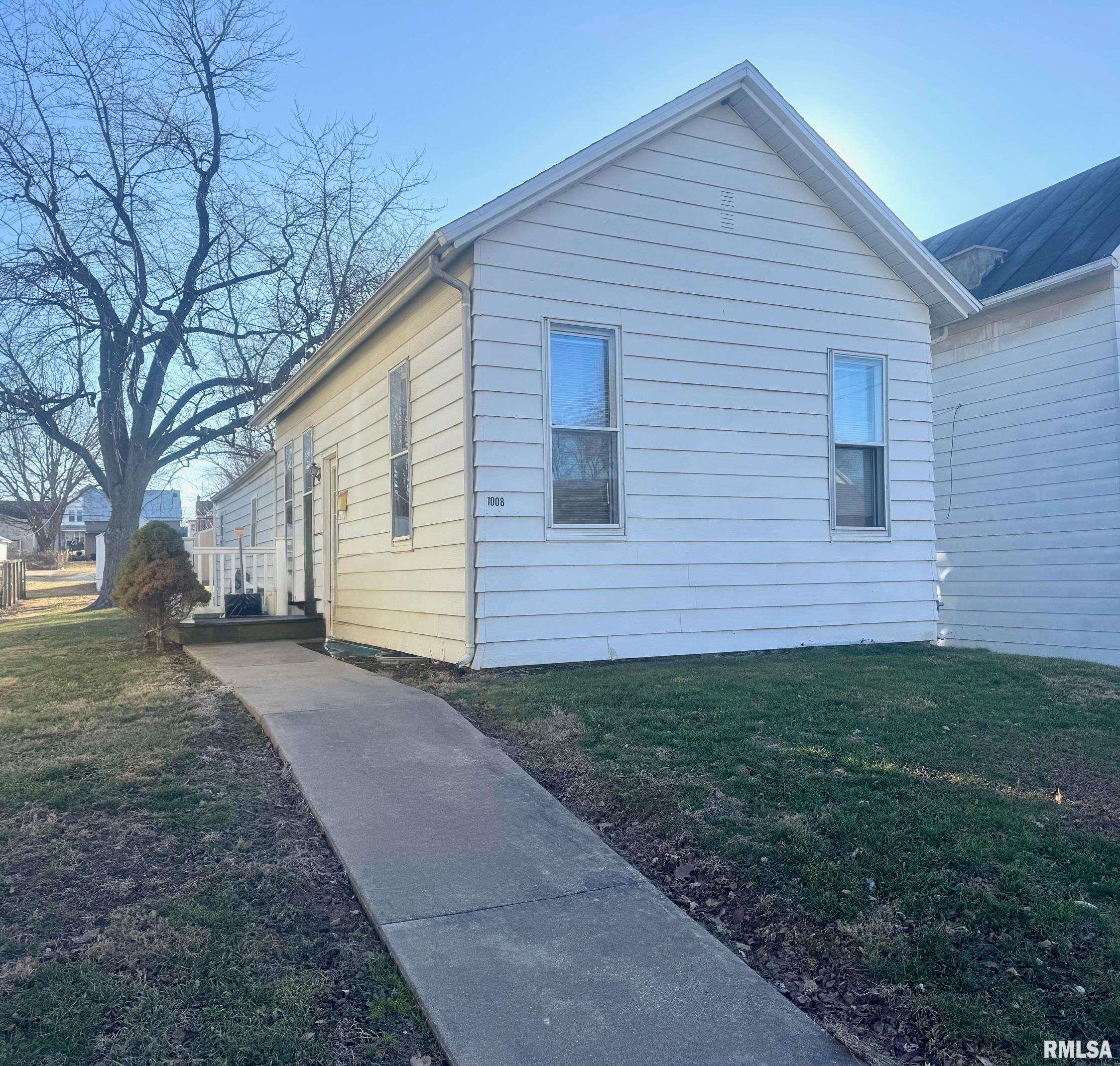 This 2 bedroom, 1 bath home is great for a first time home owner or investor.  Roof was a complete tear off and replaced in 2018. Central air was new in 2018 as well. All one level living makes this home even more desirable. All appliances convey. Large backyard with deep 1 car detached garage for covered parking and additional storage as well as alley access.  Partial unfinished basement allows for extra storage.