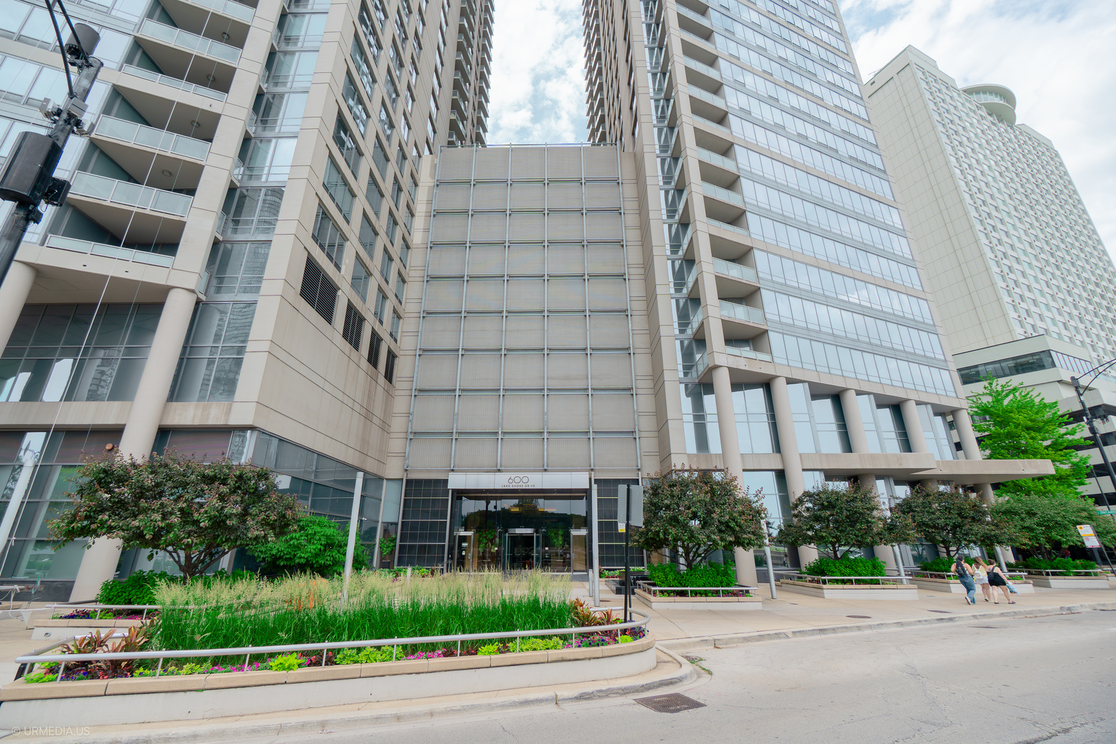 Amazing opportunity to own a showstopping 3-bedroom, 3-bath corner residence with over 2,500 sq ft of beautifully renovated living space in one of Chicago's premier full-service buildings. Perfectly perched on the 19th floor, this home offers breathtaking panoramic views of Lake Michigan from every room.  Designed for both everyday living and elegant entertaining, the expansive open-concept floorplan features wide-plank hardwood floors, oversized windows, and a sun-drenched living and dining area that flows effortlessly into a designer kitchen. The chef's kitchen is a standout, complete with custom two-tone cabinetry, professional-grade stainless appliances, quartzite countertops, a farmhouse sink, and a spacious breakfast bar.  The luxurious primary suite offers a serene retreat with stunning lake views, an oversized walk-in closet, and a spa-quality bath with dual vanities, soaking tub, and frameless glass shower. Two additional bedrooms-each with generous closet space and their own adjacent or ensuite baths-provide flexibility for guests, family, or a private home office.  A lake-facing balcony, large laundry room with storage, custom built-ins, and thoughtfully updated finishes throughout complete this turnkey home.  Located in a full-amenity building with 24-hour door staff, state-of-the-art fitness center, two rooftop sun decks, business center, dry cleaners, and heated garage parking (one space included in price with another available for purchase), all just steps from the lakefront path, Navy Pier, and world-class shopping and dining in Streeterville.
