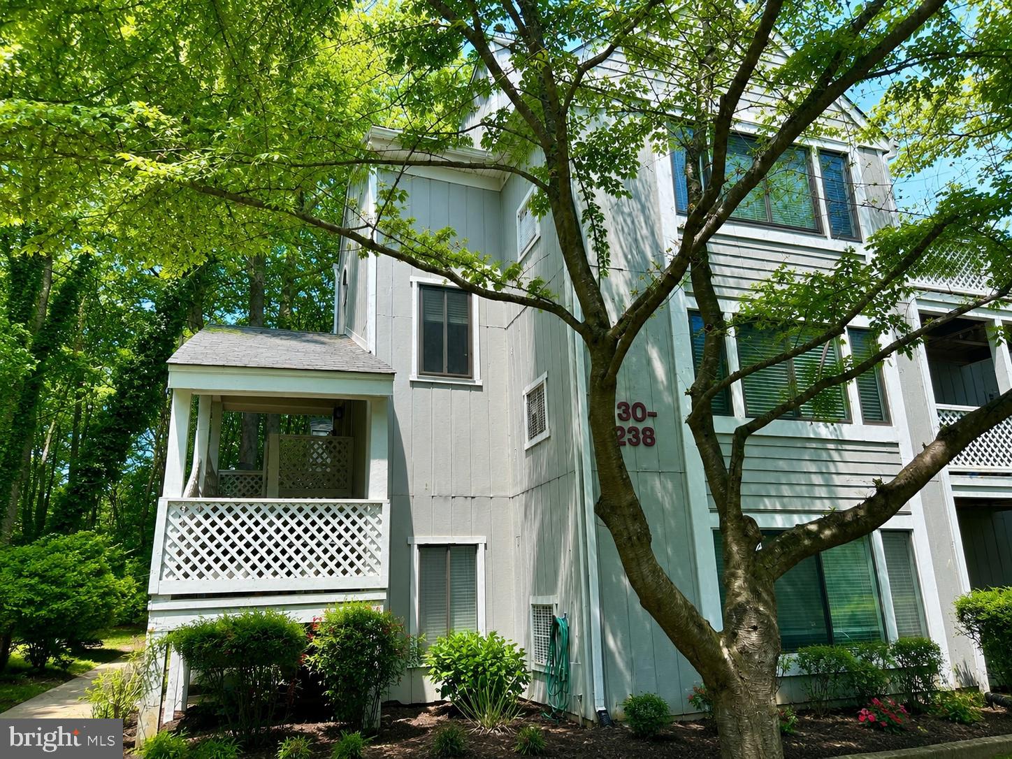 There are homes that simply check the boxes, and then there are homes that make everyday life feel a little easier, a little quieter, and a lot more enjoyable. Completely renovated from top to bottom, this beautifully reimagined two-bedroom, two-bath condominium offers the rare opportunity to enjoy a brand-new interior while living in one of Reston's most established and amenity-rich communities.The heart of the home was designed for both everyday living and effortless entertaining. The all-new kitchen features custom cabinetry, quartz countertops, new appliances, and a generous pass-through that keeps you connected to the separate dining room. Whether you're hosting friends for dinner or enjoying a quiet evening at home, the layout feels open, inviting, and comfortable.Just beyond, the spacious living room is centered around a cozy wood-burning fireplace and flows seamlessly into the sunroom, creating a bright, flexible space that's perfect for a home office, reading nook, or simply a place to enjoy the changing seasons. Step outside onto your private deck, where mornings begin with coffee and evenings end surrounded by the peaceful setting of the community.The primary suite offers a true retreat, complete with a beautifully renovated en-suite bath and a generous walk-in closet. A spacious second bedroom and fully updated hall bath provide privacy and flexibility for guests or family. An oversized laundry and utility room, attic access, and a separate storage unit offer the kind of practical storage that's increasingly hard to find.Every renovation was thoughtfully selected to create a home that feels fresh, timeless, and effortless. From the beautifully redesigned kitchen and bathrooms to the new flooring, lighting, paint, doors, hardware, and finishes throughout, every detail has been completed so you can simply unpack and begin enjoying your new home.Life here extends well beyond your front door. Walk to the Reston Community Center and Terry L. Smith Aquatics Center just across the street, spend summer afternoons at nearby Hunters Woods Pool, or explore miles of wooded trails that connect parks, lakes, and neighborhoods throughout Reston. Reston Town Center, the Silver Line Metro, shopping, dining, and entertainment are all just minutes away. On Friday evenings, neighbors gather at the community gazebo, one of the many traditions that gives this neighborhood its welcoming sense of community.With condo fees covering water, sewer, trash service, exterior maintenance, and common area upkeep, along with a reserved parking space and an additional parking permit, homeownership is refreshingly simple. This is more than a beautifully renovated condominium. It's a home designed for the way you want to live, in a community you'll love coming home to.