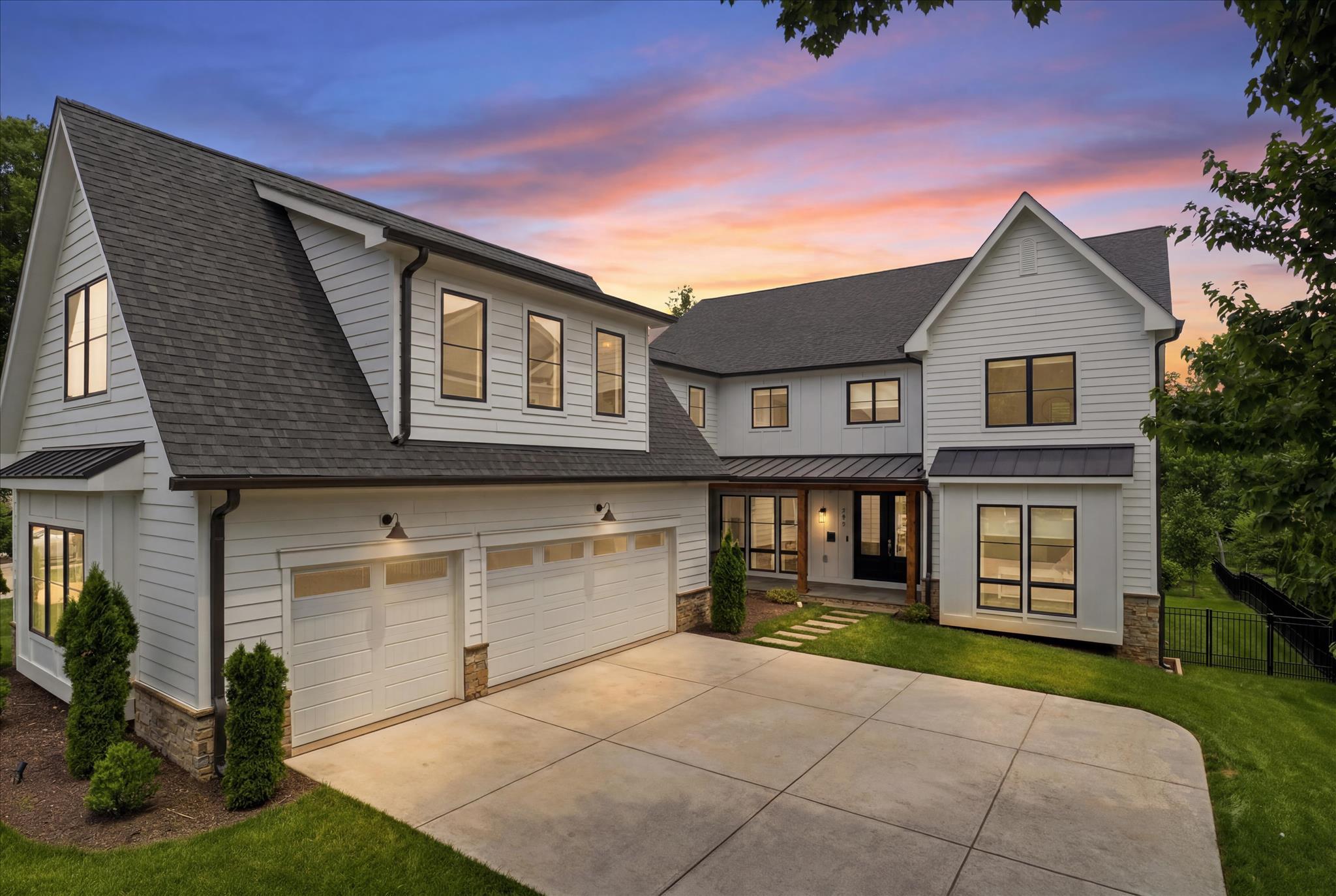 Exceedingly Rare, Once-in-a-Lifetime Opportunity for a Luxury 7,000+ sq ft 7+ bedroom, 7.5 bathroom, 3 car garage masterpiece, thoughtfully designed and carefully constructed in 2023 by the exclusive and esteemed Corinthian Homes in one of the most walkable locations within the Town of Vienna yet backing to wooded views and Wolftrap Creek. This ideal location sits on a level lot in the heart of the Town of Vienna, within the desirable south-east quadrant, walkable to almost everything, with easy access to Tyson's and 495. Constructing only a handful of homes each year, Corinthian Homes makes each project a masterpiece. No other home in Vienna is like this one. Architecturally designed to make the best use of the property and space inside, this home makes entertaining loved ones a breeze, drenched in natural light and luxury, while still being grounded in the architectural values that make this work of art a home. Generously sized bedrooms with walk in closets and ensuite full bathrooms adorn 3 finished levels, allowing for main-level living, and options for in-law or au-pair suite(s) above the garage or within the walk-out daylight basement. Entering from the front porch, you are flanked by a formal dining room w/modern crystal chandelier and access to the butler's pantry on one side, and a large bonus/sitting/bedroom or home office on the other with french doors, lots of light, two large closets, and an ensuite full bathroom. A luxury 10ft+ quartz island with seating for 8 and ample storage centers the large, luxury gourmet kitchen. Adorned with designer luxury fixtures, finishes, and appliances, the kitchen oversees the breakfast and family room w/custom gas fireplace and opens to a large private balcony with stairs to your serene backyard oasis. Tucked off the kitchen is a butler's pantry with access to an extra large room-sized walk in pantry, the dining room, and a hallway to the mudroom, lined with closets, storage, a full sized washer & dryer tucked into a closet, and powder room. The mud room features built in cubbies, a built-in dog washing station, access to the front porch and garage foyer with garage access, private secondary staircase, and built in hidden storage beneath the staircase. The over-sized 3 car garage with additional room for projects and storage. Upstairs, find an additional full sized washer & dryer in the expertly designed laundry room, additional storage, 5 spacious bedrooms with ensuite bathrooms with custom vanities and porcelain tile throughout the upper level. The primary suite features two walk-in closets, ensuite luxury bathroom w/multi-nozzle standing shower and separate soaking tub. The walk out basement boasts state of the art entertainment technology, great light, a wet bar, a large home gym also with egress and storage room, an additional large bedroom with closets, full bathrooms, and stall shower and plenty of additional storage at everyone turn. Custom window treatments, smart lighting and sound throughout. 3-zone HVAC. Walk out to enjoy your fully-fenced flat private luscious green backyard backing to Wolftrap Creek. Two houses down from Branch Road Tot Lot. Less than a mile walking distance to the Vienna Community Center, Vienna Town Green, Vienna Library (currently under construction), Freeman Store and Museum, Waters and Caffi Fields, Westwood Country Club, Church Street Shops, Whole Foods, award-winning restaurants and more that make Vienna a coveted place to call home. Walking distance to all of the town's special events like "ViVa Vienna", "Oktoberfest", "Chillin' on Church" (Vienna Block Parties) once a month throughout summer, "Summer on the Green" every Friday evening throughout summer, "Kids on the Green" every Tuesday morning throughout summer, Vienna Farmer's Markets Saturday mornings throughout spring, summer, and fall, and more! Live the life you want to live exactly where you want to live it at 202 Branch Road SE!
