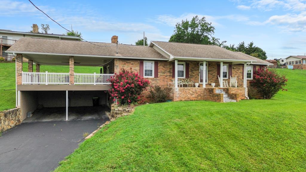 Welcome to this charming 3-bedroom, 2-bath brick home in Chilhowie, VA! Featuring hardwood floors, large rooms, a partially finished full basement with plenty of storage, and a large covered porch with beautiful views, this home offers comfort and convenience. Located just minutes from downtown Chilhowie and I-81, you'll have easy access to shopping, dining, schools, and everyday essentials!