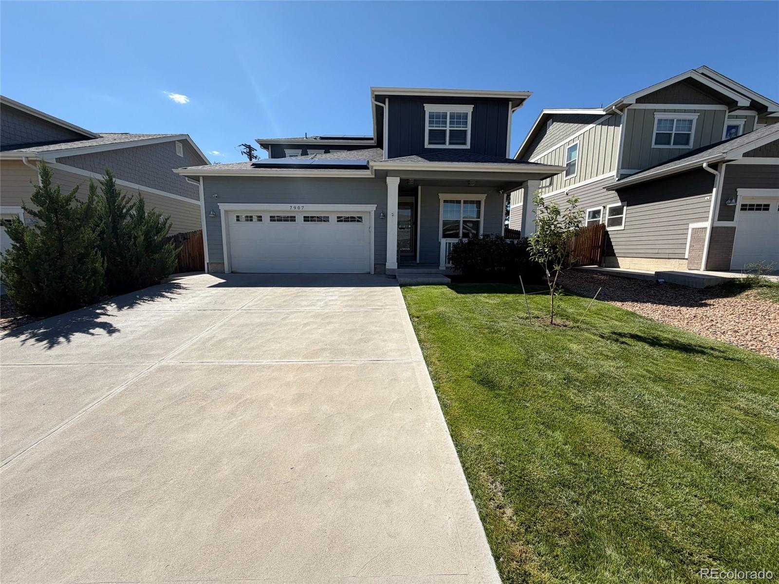 7907 Florado St is a two-story Denver home with an open-concept main level and clean, modern finishes. The kitchen features a center island, stainless steel appliances, and dark cabinetry, opening to a combined living and dining area with wood-look flooring and abundant natural light. Bedrooms include neutral carpet and ample closet storage, while the bathrooms feature a double vanity along with a combination of tub and shower options. A dedicated laundry area adds everyday convenience. Outside, a fully fenced backyard with a pergola-covered patio provides space for relaxing, and an attached two-car garage completes this well-maintained residence with practical amenities throughout every room. Included 100-Day Home Warranty with buyer activation