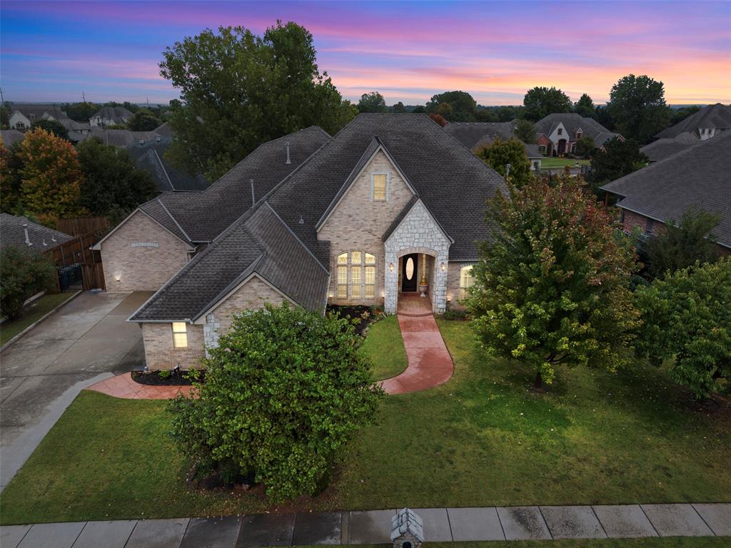 Welcome to this stunning one-level home in Edmond’s sought-after ThornBrooke Addition of Edmond, offering 4 bedrooms, 3.5 baths, 2 dining, 2 offices, bonus room, theatre room and a spacious three-car garage on .38 acre lot.  Designed for both comfort and entertaining. The gourmet kitchen is a chef’s dream, showcasing granite countertops, a large island with prep sink and pendant lighting, breakfast bar, newly painted custom cabinetry with brushed nickel hardware, modern lighting, and high-end stainless steel appliances including a six-burner Jenn-Air gas cooktop, built-in oven, microwave, and dishwasher. The open layout is highlighted by soaring ceilings, double crown molding, plantation shutters, new paint, and elegant under-cabinet lighting. The luxurious master suite offers a generous sitting area, spa-like bath with jetted tub, double vanities, a tiled shower, and a 12’ x 10’ walk-in closet with custom built-in drawers. Three additional bedrooms are thoughtfully arranged on the opposite side of the home—one with an adjacent bath and two connected by a Jack & Jill. Every bedroom features a ceiling fan, adding to the comfort of the nine fans throughout the home. Outside, enjoy a private fenced backyard in a highly regarded Edmond school district. With its blend of style, function, and thoughtful details, this home is truly move-in ready. Easy commute to I-35 and Turnpike, Mercy Edmond, eateries and shopping.