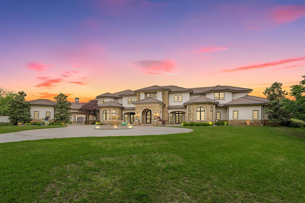 MOTIVATED SELLER! ALL OFFERS CONSIDERED! ONE CONVERSATION MAY MAKE THIS YOUR NEXT HOME! Experience the pinnacle of luxury on 4.83 gated acres in Southlake’s prestigious Carroll ISD. breathtaking estate is a masterpiece of design, offering unrivaled blend of elegance, exclusivity, & world-class amenities. A sweeping circle drive leads to a grand motor court & 6-car garage, while the resort-style grounds feature a regulation-size indoor basketball court, an oversized sparkling pool with slide and jacuzzi, multiple outdoor sitting areas, a full outdoor kitchen, and a stunning outdoor fireplace—creating the ultimate private retreat for relaxation and entertainment. Inside, every detail has been meticulously curated for the discerning homeowner. An elevator provides seamless access to both levels, while the entertainment wing boasts a game room with wet bar, multi-tiered media room, and a two-lane bowling alley—perfect for hosting unforgettable gatherings. Stay active in the private gym or work in total privacy with his-and-her executive offices, each outfitted with custom built-ins for maximum efficiency. The palatial Owner’s Retreat is a sanctuary unto itself, featuring a spa-like En-Suite and expansive his-and-her custom closets—hers including a stackable washer and dryer. Two additional guest suites are thoughtfully positioned on the main level, while five more bedrooms, each with private En-Suites, and two living areas await on the second floor. The gourmet kitchen is a chef’s dream, featuring top-of-the-line stainless steel appliances, a built-in fridge-freezer, a commercial-grade gas cooktop, double ovens, dual dishwashers, and warming & cooling drawers. A generous walk-in pantry and a well-appointed butler’s pantry—complete with a beverage fridge and dishwasher—ensure effortless entertaining. Exuding timeless elegance and modern convenience, this estate is a rare opportunity to own a true sanctuary of luxury. See documents for a full list of features and updates.