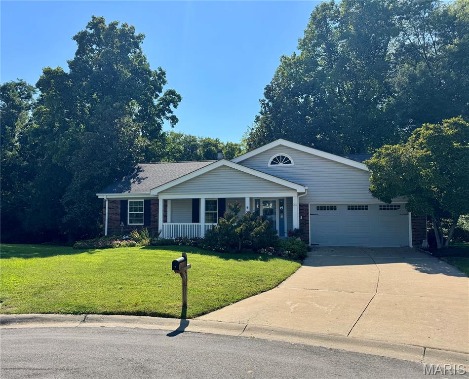 Professional photos will by uploaded Thursday, 9/3! Welcome to 20 Ardennais Road, a lovingly maintained 3-bedroom, 2-bath ranch offering an exceptional opportunity in desirable Drover’s Crossing Subdivision. Tucked on a quiet cul-de-sac and cherished by the same owners for 40 years, this special home is ready for its next chapter. Step inside to a vaulted great room filled with natural light from skylights and anchored by a dramatic floor-to-ceiling stone hearth with gas log insert. Recently added solid oak hardwood flooring flows through the entry, hallway and great room, while the open layout connects seamlessly to the eat-in kitchen. A wall of windows across the back of the home draws your eye outside to what may be this property's most unforgettable feature—an expansive, private and beautifully landscaped .82-acre backyard with inground sprinkler system. A massive deck sits just a few steps above the park-like yard, making indoor-outdoor living effortless. Mature landscaping, an inground sprinkler system, creek access and a walking trail at the rear of the property create a peaceful setting that feels like your own private retreat. Thoughtful features include heated tile floors in the kitchen and primary bath, a newer triple-door system to the deck, JennAir downdraft range, an epoxy garage floor, drywalled garage and newer insulated garage door. The open staircase leads to a clean, partially finished lower level with a spacious laundry/craft room, flexible recreation room and abundant unfinished storage. The kitchen refrigerator, washer and dryer, and natural gas grill remain with the home. Homes with this much land, privacy and potential don't come along every day. Move in and enjoy it just as it is, or bring your own ideas and make this longtime-loved home uniquely yours.