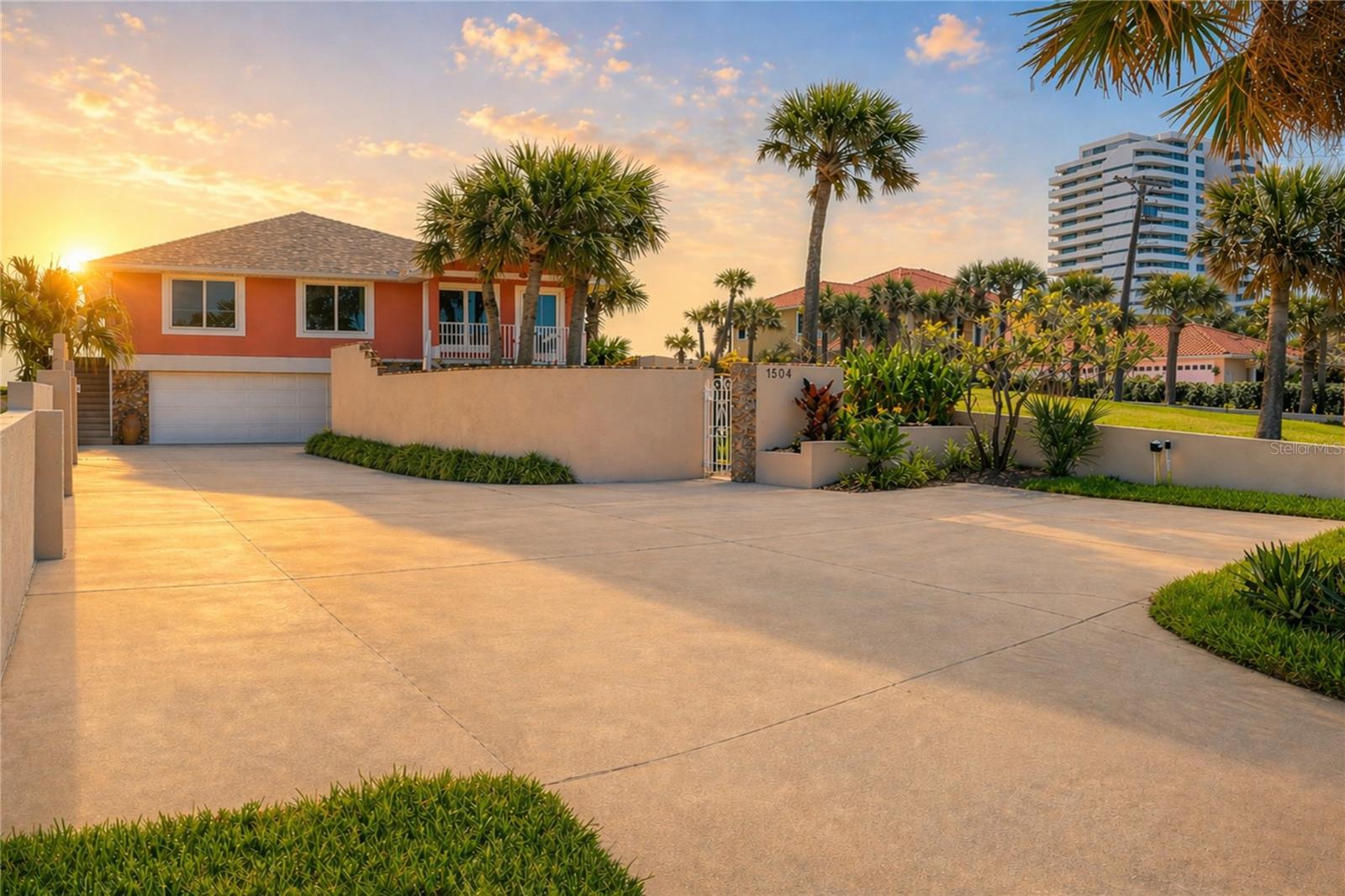 "Located on a pet friendly beach." This lovely coastal ocean front home offers 4 bedroom - 3 full baths completely reimagined with timeless coastal charm. With approximately 3,312 square feet of total air-conditioned living space which was thoughtfully designed across two levels. The main level features 2 bedrooms and 2 full baths, including a spacious primary suite, along with inviting living and dining areas, a well-appointed kitchen, and seamless indoor-outdoor flow. The lower level provides an additional 1,017 square feet of air-conditioned space, offering two private rooms, a full bath, and a generous flexible living area ideal for guests, a home office, fitness, or recreation space. This level presents a valuable opportunity to personalize and enhance while already delivering functional, usable space that complements a variety of lifestyle needs. The home also features a rebuilt seawall (2023/2024) with reinforced side walls and a retaining wall along the yard parallel to the ocean. Additional upgrades include a 2023 roof, a whole-house generator, natural gas service, an electric front door shutter, an updated air-conditioning condenser (coated for coastal durability) and a tankless water heater. Inside, the residence showcases a sophisticated coastal aesthetic with travertine and luxury vinyl flooring, two fireplaces and abundant natural light. The gourmet kitchen features custom cabinetry, granite countertops, a mosaic tile backsplash and a full suite of high-end appliances, including a Bertazzoni gas range, stainless hood, built-in oven and microwave, French door refrigerator, dishwasher and Monogram wine chiller. The kitchen opens seamlessly to the main living areas, capturing stunning ocean views. The primary suite offers a serene retreat with a linear fireplace and spa-inspired bath featuring a double vanity, vessel sinks and a spacious walk-in shower. A well-designed walk-in closet and private Stiltz lift provide added convenience. The home offers four bedrooms and three full baths, with additional living space on the lower level, including a separate living room and exercise area. Outdoor living is equally impressive, with an inground pool overlooking a wide, hard-packed beach that stretches dramatically at low tide, perfect for walking and enjoying the coastal lifestyle. Just minutes from dog-friendly beach access, this property offers privacy and convenience. A rare opportunity to own a thoughtfully remodeled oceanfront home that balances charm, functionality and long-term value while enjoying sunrise and sunset views.