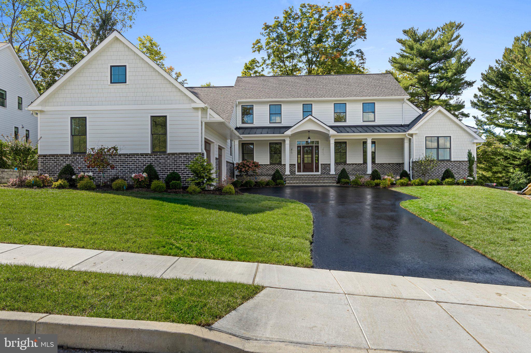 Discover your dream home at 105 Privet Lane, Radnor, PA 19087, a stunning just completed new construction home nestled on a .38-acre lot. This exceptional 5-bedroom, 3 full ½-bath home is part of an exclusive newly developed 6-parcel subdivision/neighborhood in Radnor, Upper Merion Township. Enjoy the tranquility of this private and serene setting, conveniently located on a cul-de-sac street with picturesque views of open space that was originally part of a grand Radnor estate home that still sits next to these new builds, providing a beautiful and historic backdrop for these new homes.  This property features a coveted Wayne mailing address while benefiting from the exceptionally low taxes of Radnor, Upper Merion Township as it sits just across the township line. Located just minutes from downtown Wayne and Villanova, it offers an easy commute to Conshohocken and seamless access to both Montgomery Avenue and Lancaster Avenue for a quick drive to all towns along the Main Line! Designed by JH2 Designs, LLC and crafted by D’Orazio Construction LLC, this home exemplifies custom luxury. The exterior boasts white Hardie board plank siding, a roof with 30-year CertainTeed Landmark Pro fiberglass shingles, and a side-facing 2-car garage with elegant carriage doors, all contributing to exceptional curb appeal. Enter through the covered front porch into an open foyer, with stairs off to left, straight ahead is the great room with covered porch off the back and island kitchen and breakfast room to the left. A truly open concept space. Down the front hall to the right is a private home office/den. Nearby is the main floor primary suite with a gorgeous primary bath with dual sinks, soaking tub, walk in shower and 2 walk in closets. Note - A second primary suite is on level two, providing options for guest suites and more.  To the left of the foyer and off of the 2 car garage and kitchen are the  mudroom, powder room and laundry room. Plans are attached including a furniture layout plan for the main floor. Upstairs are 4 additional bedrooms and 2 full baths and a bonus room. One bedroom would make an ideal upstairs family room. Bedroom 2 could be a primary bedroom as it is ensuite and offers a walk in closet. The hall bath offers a dual sink vanity.The property includes a sodded lawn and a landscaping allowance for the buyer. Each of the six custom homes is built with innovation and attention to detail. Two of the homes were built by E. B. Mahoney Builders and sold for $2.8M. This ultra-convenient location is less than 1 mile to the Radnor train station and several great dining spots, just 1.5 miles from the center of the shopping area in Wayne, 5 miles from Suburban Square and the Ardmore train station with Amtrak service to NYC, 12 miles from Philadelphia, and 4.5 miles from the King of Prussia Mall.