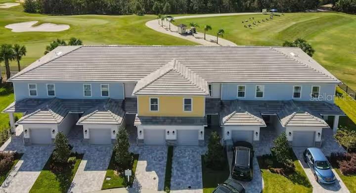 MOTIVATED SELLER - Prime Clubhouse Location & Top-Tier Rental Income - This is a rare chance to own one of only a handful of Reunion Resort townhomes located just steps from the Nicklaus Clubhouse and driving range. Beautifully furnished and turn-key, this 3-bedroom, 2.5-bath home offers over 1,700 sq. ft. of stylish living and stands out as a consistent high-income producer with exceptional occupancy rates.

Guests are drawn to the unbeatable location—walk to golf, dining, and resort amenities—and the home’s open-concept design, fully equipped kitchen, and private patio with sweeping golf views. Reunion Resort’s world-class offerings include three signature golf courses, a waterpark, spa, fitness center, walking trails, and award-winning restaurants, all just minutes from Disney.

Whether for steady rental income, a low-maintenance investment, or your personal getaway, this property’s proven performance and prime position make it a true standout.