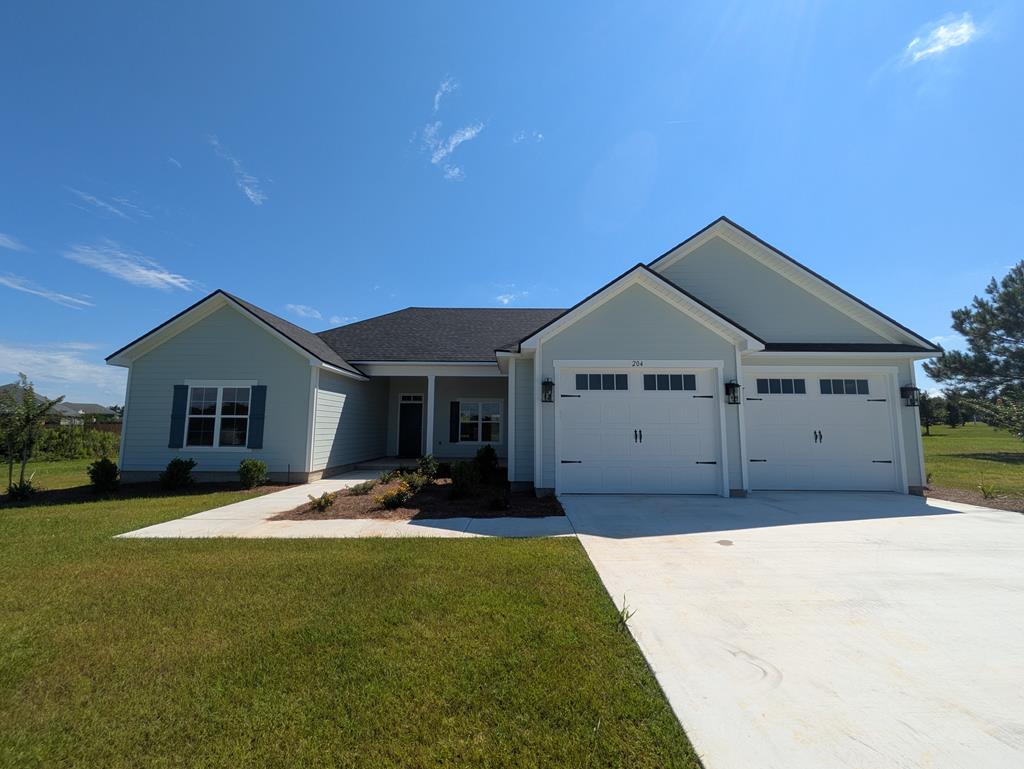 Brand new 4-bedroom, 2-bath home located in the spectacular Southern Pointe subdivision on one of the best lots in the neighborhood! Enjoy all the benefits of new construction, thoughtfully designed with modern finishes, a functional floor plan, and low-maintenance living from day one. Ideally located, this home offers the best of both worlds. Whether you're commuting to Valdosta for work or spending weekends enjoying Thomasville's charming downtown, you'll love having the peace and privacy of country living while being just 20 minutes from historic downtown Thomasville.  The welcoming front and back porches are the perfect places to sit back, relax, and enjoy the breeze. Situated on a spacious one-acre lot, there's plenty of room for kids, pets, gardening, or simply enjoying the outdoors.  Inside, the beautifully appointed kitchen is the heart of the home, offering an oversized island that's perfect for meal prep, casual dining, or gathering with family and friends while remaining open to the spacious living area. Trey ceilings in both the living room and primary suite create an airy, inviting feel throughout. The primary suite offers a peaceful retreat with double vanities, a luxurious walk-in shower, and an oversized walk-in closet.  On the opposite side of the home, three additional bedrooms provide plenty of flexibility for children, guests, a home office, or hobbies. With the quality and peace of mind that come with new construction, a desirable one-acre homesite, and an ideal location between Valdosta and Thomasville, this home is ready to welcome its very first owners.