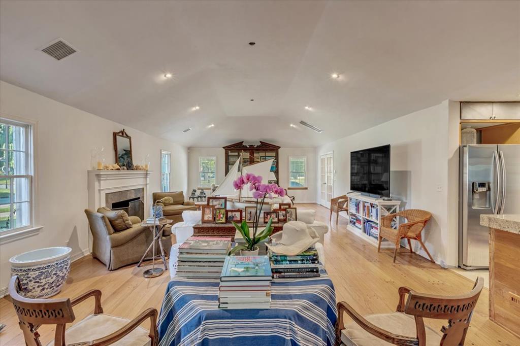 Stunning Colonial-style residence on a sprawling corner lot in Nichols Hills! This 1951-built home offers 4 beds, 3 baths, and over 3,100 sq ft of inviting living space. Step inside to discover a cozy living room with a wood burning marble fireplace and gorgeous oak hardwood floors. The kitchen features Thermador appliances, a gas range, and a wine bar—perfect for entertaining. Retreat to a private, treed backyard with endless potential for a pool, guest quarters, or second-story expansion. With modern updates throughout and a spacious, serene setting, this home is a rare chance to customize your dream residence in Nichols Hills.