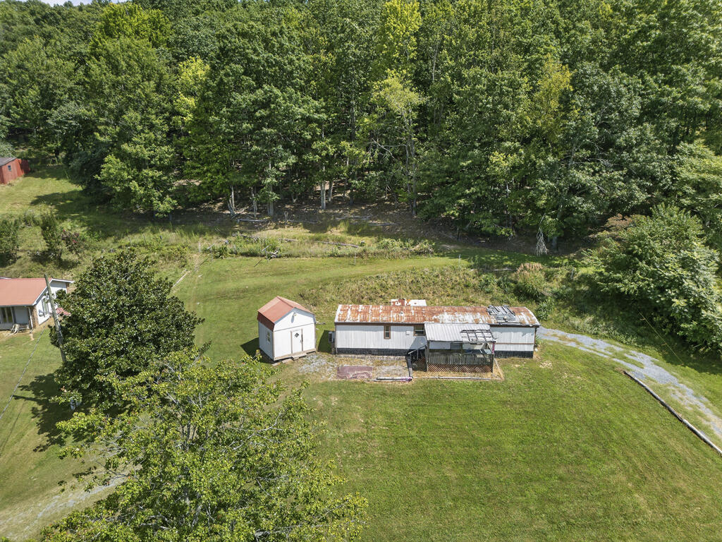 Discover the possibilities with this 0.7-acre building lot offering a great opportunity to create the home you've been envisioning. Public water is available, and a septic tank is already emplaced, providing a convenient head start for future construction. With its combination of usable acreage and existing utilities, this property offers an excellent foundation for building a home in a setting you can make your own. Whether you're ready to build now or planning for the future, this lot is worth a look!