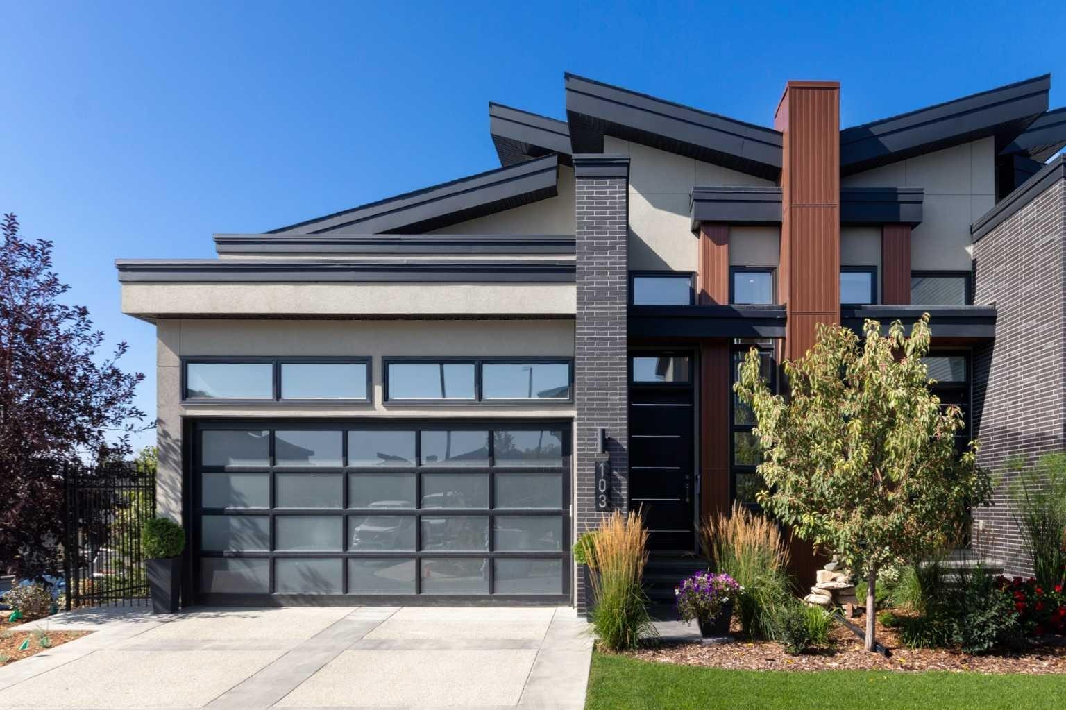 Experience refined luxury and sophisticated design in this stunning walkout villa in exclusive Elveden Court! Magnificent Rocky Mountain and Elbow River Valley views from upgraded indoor living space and surprisingly private outdoor living areas.  MAIN: Step out to a peaceful, private, glass rail deck with gas fireplace, gas BBQ, and power steel louvre pergola for sun or shade. Perfect for outdoor dining or enjoying serene sunsets with friends and family. Step in to towering 18’ vaulted ceilings, floor to ceiling windows and numerous skylights spill natural light into generous size living spaces all day. Multiple eye-catching interior architectural ceiling features even in the foyer and powder room, ideally accented by the artful collection of upmarket chandeliers & light fixtures. Substantial and impressive floor-to-ceiling brick fireplace in the vaulted living room. Large dining area and a chef’s kitchen with premium appliances, dual wall ovens, gas cooktop with wall faucet, roomy prep/breakfast island. Note the custom hardware extras to enhance function/storage. Discreetly located office with built-ins and bright window. Primary bedroom has amazing sunset views, luxurious en suite with skylights and walk-in closet. Laundry room with ample storage and mud room with easy garage access (room for lifts!) and side exit to a fenced dog run.  WALK OUT: In floor heating, large rec room with 3rd fireplace connected to peaceful covered patio (gas) and fenced grass area. 2 large bedrooms, plus dedicated gym/exercise room with rubber floors, glass wall feature wine room, wet bar and extra storage. This home was one of the first homes built in the complex, chosen for its views, corner lot privacy and the unique opportunity to work with designer Paul Lavoie to customize design choices more than the subsequent builds in the complex. Extensive and expensive upgrades plus the amazing views help make this great home truly exceptional!  Conveniently located close to Aspen Landing, Westhills, Westside Recreation Centre, walking/bike paths, multiple golf courses, major commuting routes and 69th Street LRT.  Click 3D for interactive floor plan. Open House - Sunday Sept. 21 2-4 P.M.