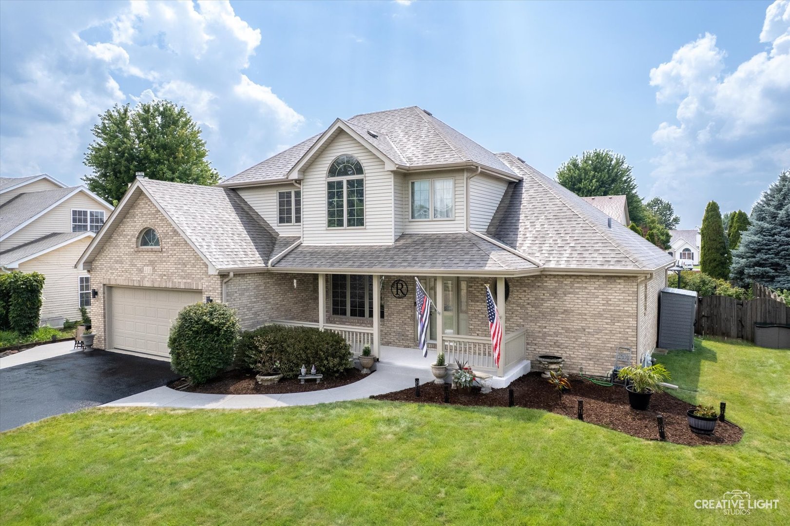 If you love a great front porch- this one is for you! And it just happens to be connected to an amazing house! As soon as you walk in, you'll be welcomed by a soaring ceiling that opens up to a beautiful wall of architecturally pleasing windows that the showcase the brick fireplace in the large great room, the heart of the home. Off the welcoming, bright and airy foyer there is a gorgeous dining room. From the beautiful floor to the stunning windows to the Swarovski crystal chandelier, it is an amazing room to entertain in. This home has a first-floor master suite with windows overlooking the beautiful backyard with a built-in pool and gazebo. Master suite bath has a thoughtfully laid out floorplan that includes a separate area with toilet and a shower. Master bath also includes dual sinks, whirlpool tub and walk in closet. In the large kitchen, you have tons of cabinet and counter space including an island to work on. Solid oak cabinets with granite tops and stainless-steel appliances. Appliances are included. Off the kitchen there is a nice laundry room with a utility sink and closet. The other 3 generous sized bedrooms are on the second floor, with new carpet, ceiling fans and freshly painted. There is also a large bathroom with dual sinks, shower/tub combo and a huge linen closet. A huge basement that includes a rec room, office and plenty of storage, a workroom with utility sink and electrical subpanel and still room to grow. Garage has EV charger and hot/cold water access. BUT- the backyard is what you'll be in love with! An everyday vacation and retreat! Your own private oasis. A built-in pool and gazebo, a seating area and a covered porch to unwind on. All pool equipment included. Landscaped beautifully! A showstopper! All this home is missing is YOU!