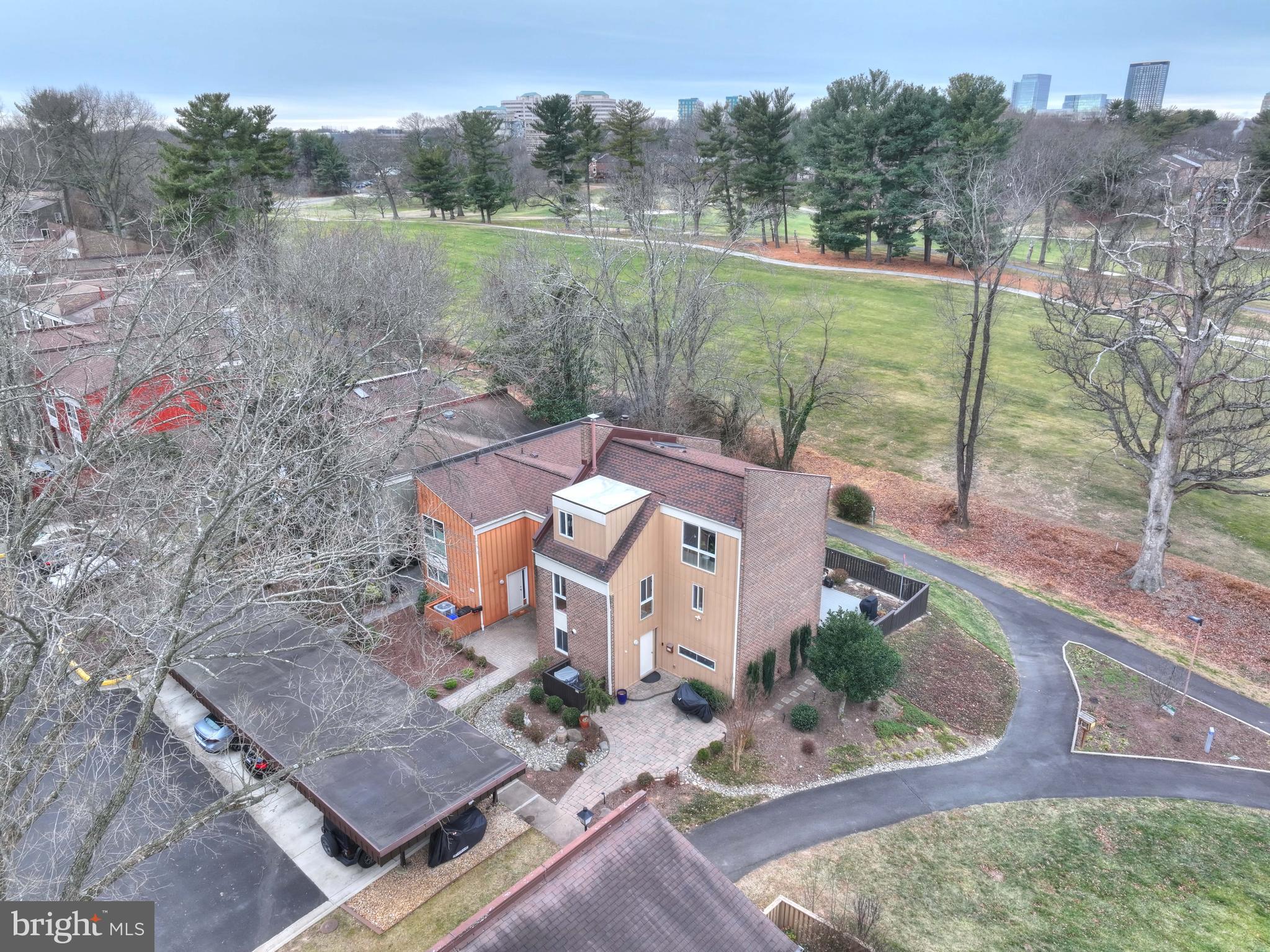 Best golf course view in Reston! Relax on your new trex deck, enjoy the expansive  and peaceful views beyond. Gorgeous.  Beautifully maintained, updated, three level home, with carport, lovely ambient light. 3.5 baths.  Floor to ceiling windows on main level offer beautiful views in all directions.  Open living-dining area adjoins kitchen which has been updated.   All feels fresh -- neutral paint, excellent condition. Kitchen offers stainless appliances, ample cabinetry, efficient layout, convenient desk area for easy living.  Wood floors throughout - no carpeting.  Powder room off the foyer, and access to utility , laundry and storage area. Upper level features three spacious bedrooms, two updated bathrooms.  Second upper level is a versatile space, possible 4th bedroom with third full bath, or family room/rec room - an inviting warm and cozy space with a wall of built-ins,  and a large deck overlooking the golf course.  Great for morning coffee or yoga.  Large walk-in storage area on this level.   More storage in double sheds outside. Walk to Lake Anne - farmers market, restaurants. Lovely Golf Course Island community pool, 10 min drive to Dulles Airport.  The best of Reston living.  New roof.  --- Open Houses May 2nd and 3rd, 2-4 pm.