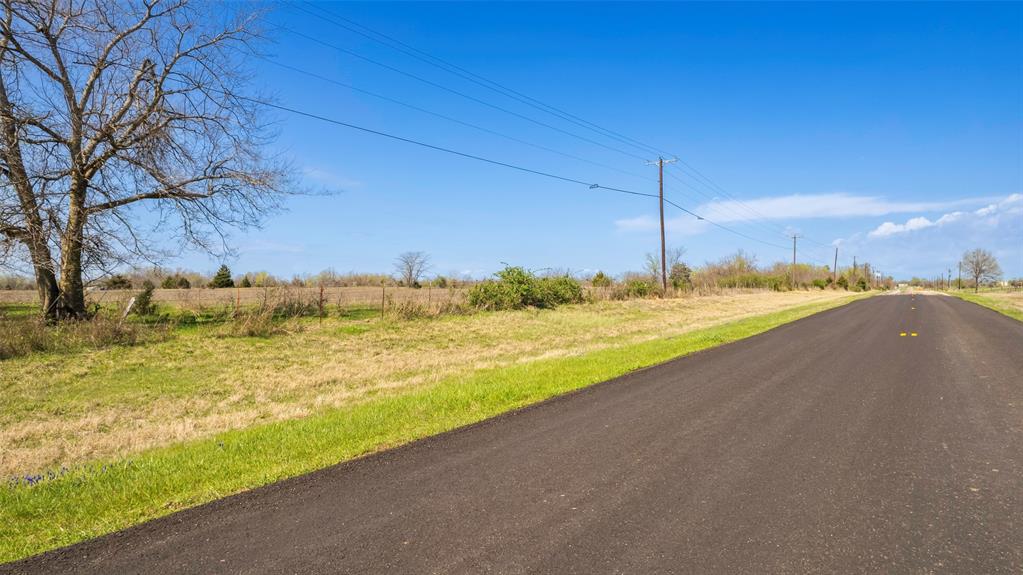 Here is a beautiful 33 acres with scattered trees that come with plenty of pasture for your livestock! With many possible build sites for your dream home, you'll find easy access to this property from the Farm Road. An AG-Exemption, Bermuda grass, and some barbed wire fencing are already in place--ready for use as a ranch. With no known restrictions, this allows you to live in an RV while you build, have a tiny home, or add a manufactured home, giving you flexibility for housing options. This picturesque property provides a peaceful spot within a 1.5-hour commute from downtown Dallas! BUYER TO VERIFY AVAILABILITY AND COST OF WATER METER. POWER LINES ARE AT ROAD. SELLER IS OFFERING A FENCING ALLOWANCE WITH ACCEPTABLE OFFER.