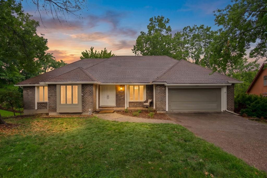 The perfect blend of updates & retro cool! This spacious 4 bdrm/3 bath true ranch has undergone extensive improvements & thoughtful updates, offering buyers peace of mind and move-in-ready convenience in the highly desirable Glen Lakes  community. Nestled on a quiet cul-de-sac & backing to peaceful greenspace, this home offers the privacy and serene setting you've been searching for. Inside, you'll find vaulted ceilings, fresh interior paint, updated lighting, new ceiling fans, added recessed lighting, and brand-new carpet creating bright, inviting living spaces throughout.The beautifully reimagined primary bath has been completely remodeled with today's style & functionality in mind, while the lower-level bath & wet bar have also been tastefully updated. The walk out lower level offers exceptional flexibility with a 4th bedroom, full bath, fireplace, updated wet bar, expansive rec room plus a dedicated home theater room, perfect for entertaining, movie nights, or multi-generational living. Outdoor living has been transformed with a brand-new deck spanning the back of the home, accessible through new french doors & overlooking tranquil greenspace and the large, private backyard. Fresh exterior paint and refreshed landscaping further enhance the home's curb appeal. Additional highlights include three true garage spaces, an extended driveway, and rear parking. The third car garage would make an ideal workshop. Major improvements have already been completed, including sewer line repairs, plumbing repairs, popcorn ceiling removal with new knockdown texture throughout, updated GFCI outlets and much more! Detailed documentation of completed improvements is available for buyer review. Enjoy all that Glen Lakes has to offer, including lake privileges, fishing, and nearby walking trails. With extensive updates already completed, this exceptional home is truly move-in ready and waiting for its next owners.