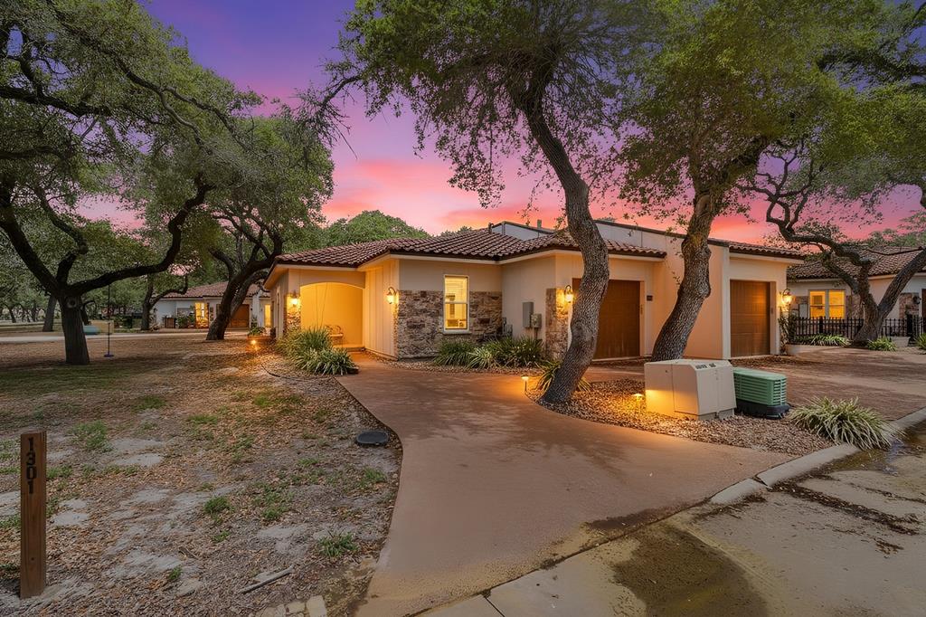 Welcome to relaxed coastal elegance in this beautifully appointed Mediterranean-style villa, ideally situated within the prestigious gated community of Royal Oaks. Stretching from Fulton Beach Road to Highway 35 North, this highly desirable neighborhood offers a peaceful, private setting with lush Oak trees and a laid-back coastal atmosphere. Residents enjoy an exceptional lineup of amenities, including a putting green, a waterfront gazebo with fire pit, a resort-style pool, and a private pier extending into the serene waters of Aransas Bay&mdash;perfect for fishing, birdwatching, or unwinding in the bay breeze. Inside, the home showcases a light-filled open-concept design that maximizes natures views and creates an inviting space for both everyday living and entertaining. The kitchen features stainless steel appliances, a gas range, granite countertops, abundant cabinetry, and a center island with bar seating for casual dining. In addition to two spacious bedrooms with low-maintenance flooring and generous closets, this property stands out with a versatile air-conditioned bonus flex/bunk room surrounded by full glass windows&mdash;an ideal space for guests, a home office, or a cozy retreat with abundant natural light. The primary suite offers a private en-suite bath, a large walk-in shower, and French doors that open to a separate screened-in porch, creating a peaceful indoor-outdoor escape. With its thoughtful layout, added living space, and access to outstanding community amenities, this villa presents a unique opportunity to enjoy the best of coastal living in Royal Oaks.