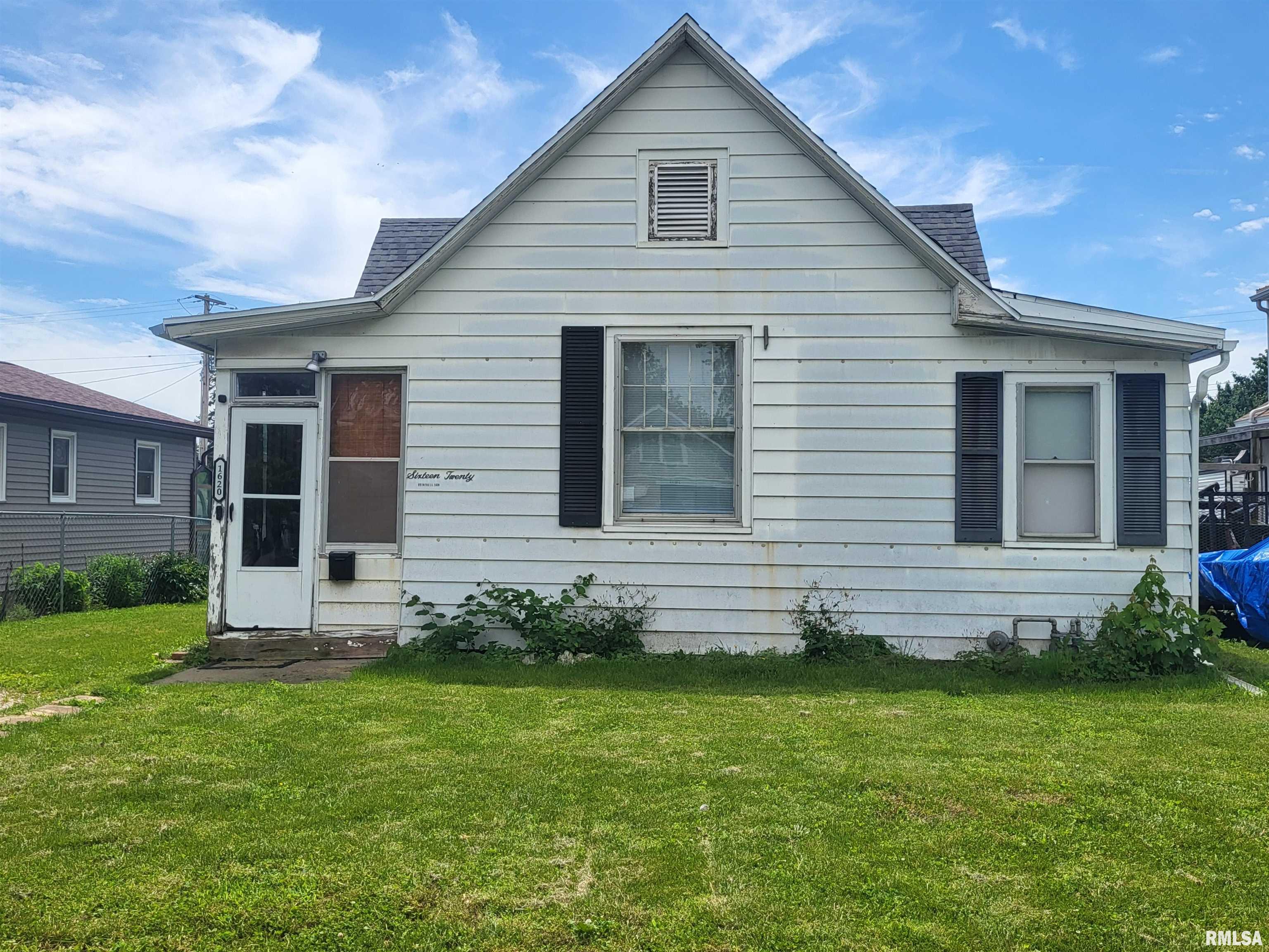 Welcome to 1620 Locust. Spacious one level living with main floor laundry and heated enclosed back porch. Alley access and off-street parking.  Great Investment opportunity or put your own personal touch on it and live in it yourself.  Selling As-Is