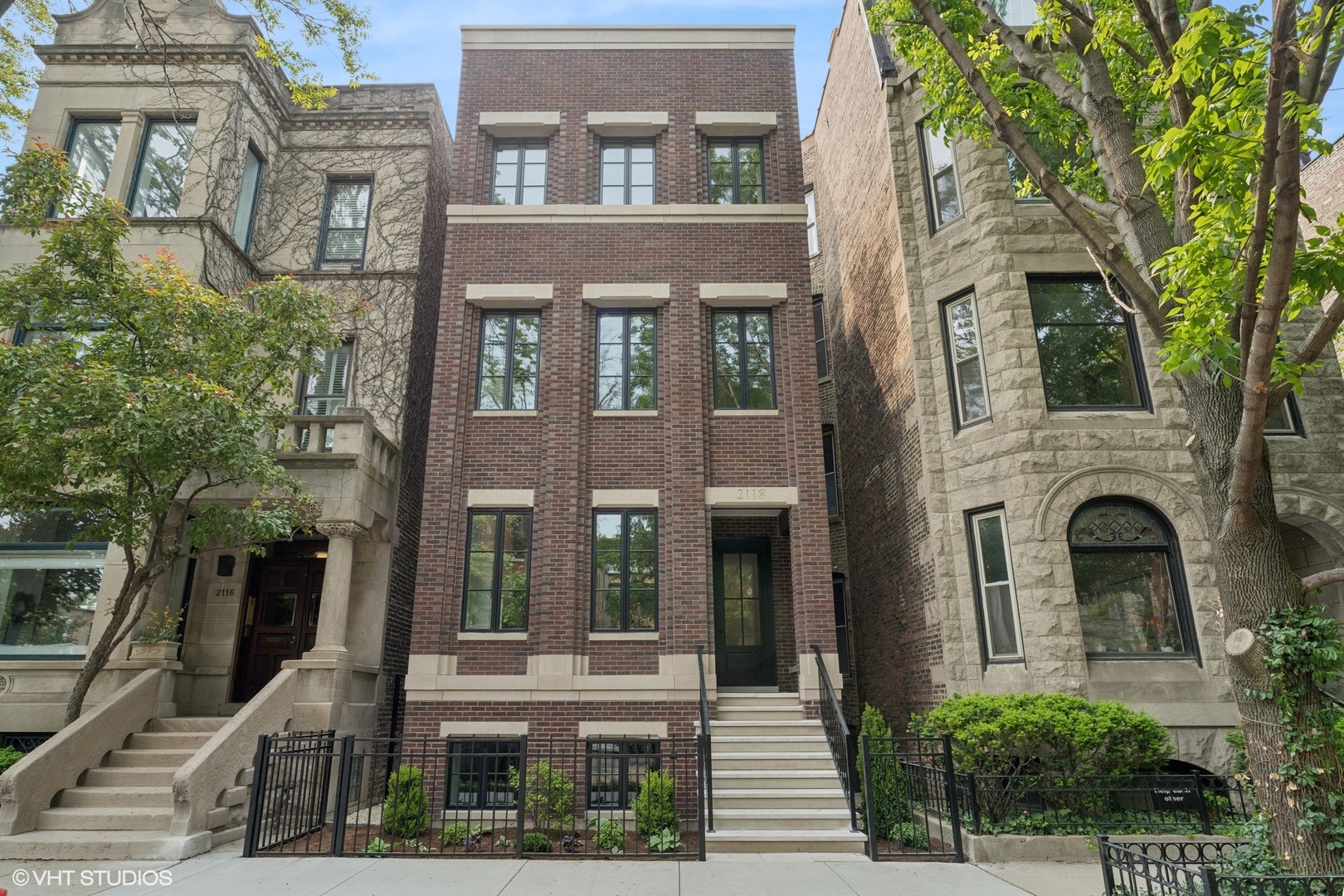 Stately brick and limestone new construction duplex up in an intimate two unit building. Situated in the heart of Lincoln Park, featuring unparalleled finishes throughout and presented by an experienced Lincoln Park builder. This four bedroom three and a half bath home boasts an open floor plan with abundant outdoor space. Expansive white kitchen with professional grade appliances included Subzero and Wolf, stone countertops with stunning waterfall edging and a full height backsplash. Oversized family room / dining with fireplace. Great room with a dry bar opens to a 300 square foot covered patio with an outdoor fireplace perfect for entertaining. Four bedrooms and three bathrooms up with a true laundry room. Owners suite with two walk in closets and designer bathroom including oversized shower with rain, free standing soaking tub, double vanity and heated floors. Generously sized bedrooms, one with on suite bathroom perfect for guests and a versatile fourth bedroom with french doors. Private roof deck completed in pavers with water and gas hook up. Private 1.5 car garage provides additional storage and is per-wired for EV charges / heaters. Property is complete and ready for occupancy, buyers will not be disappointed.