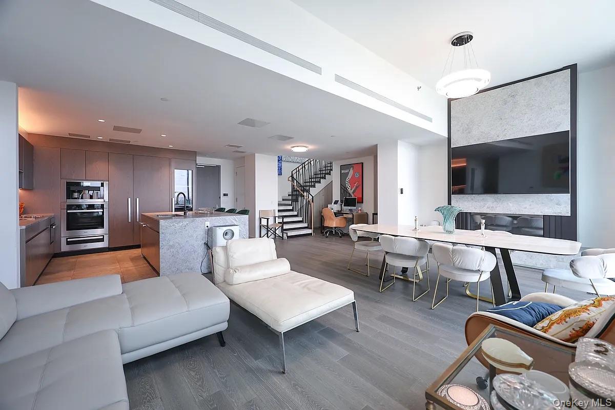 Tangram house west is an interior landscape, inspired by the culture and dynamic energy of Flushing-Yet also providing residents a respite form the city. It Designed by award -winning architect and interior designer Jean-Gabriel Neukomm, This Most Luxury Condo located at most convenient location of Flushing. Beautiful penthouse apartment. Large 3 bedroom with 3.5 Full Bath and huge Private Roof top (about 1000 sq feet) MIELE kitchen appliances throughout, custom Italian cabinetry, in-unit washer and dryer. Amenities include a 3,500 sq ft pavilion exclusively to residents and an 8,000 sq ft fitness club including a swimming pool, a yoga studio, and a gym, Additional amenities include walking garden, outdoor tennis court, BBQ area, dog run and more. Valet parking for residents.